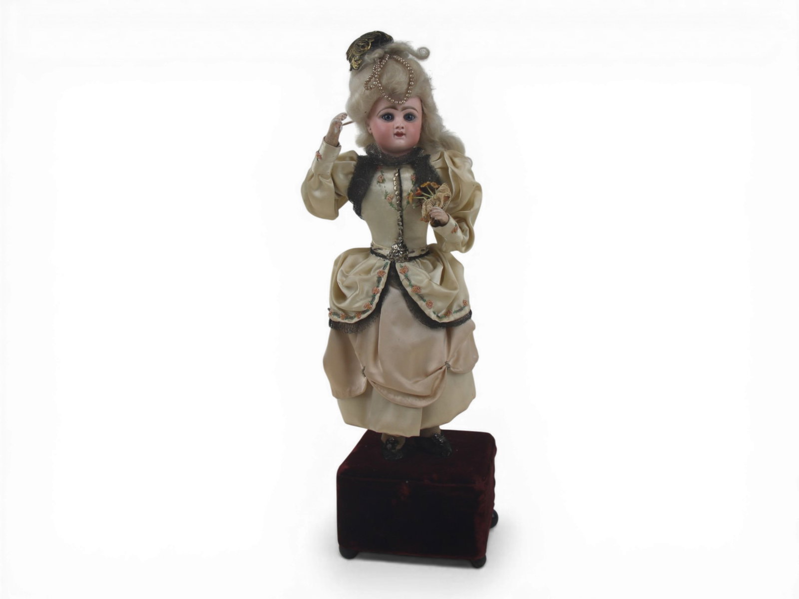 French Automaton Doll: 12 inch French automaton doll with bisque socket head, mechanical armature body, and bisque hands. Mechanism not functioning. Circa 1885-1890. Shipping: Weiss Auctions offers full-service, in-house sh
