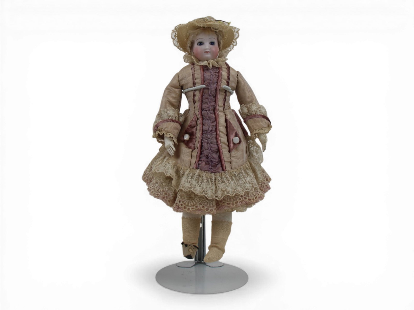 French Bisque Head Fashion Doll: 11 inch bisque shoulder head fashion doll with costume attributed to Rohmer. Circa 1875. Shipping: Weiss Auctions offers full-service, in-house shipping for nearly all items in this auction. For a shi