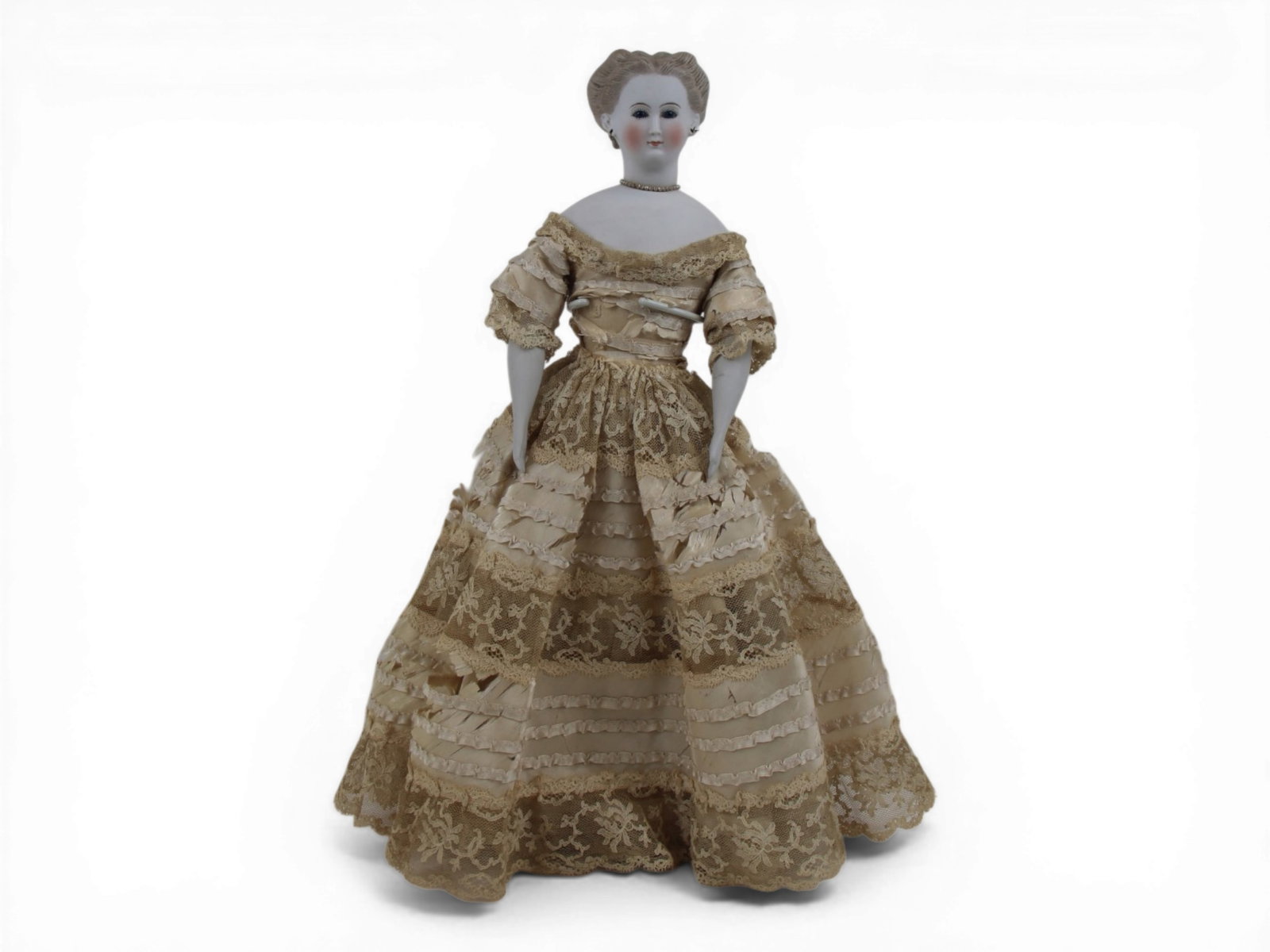 German Parian China Head Doll: 15.5 inch parian china head doll with blue glass eyes on cloth body with china limbs and antique lace dress. Circa 1860s. Shipping: Weiss Auctions offers full-service, in-house shipping for nearly all
