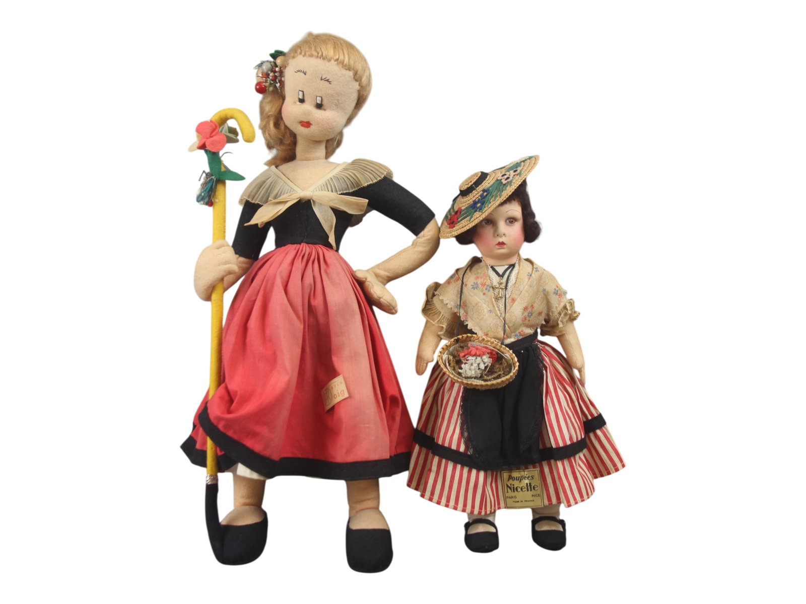 (2) Felt Souvenir Dolls: Two felt souvenir dolls by Raria and Nicette in Spanish and French regional costumes. Measuring 14 to 20 inches. Circa 1930s. Shipping: Weiss Auctions offers full-service, in-house shipping for nearly