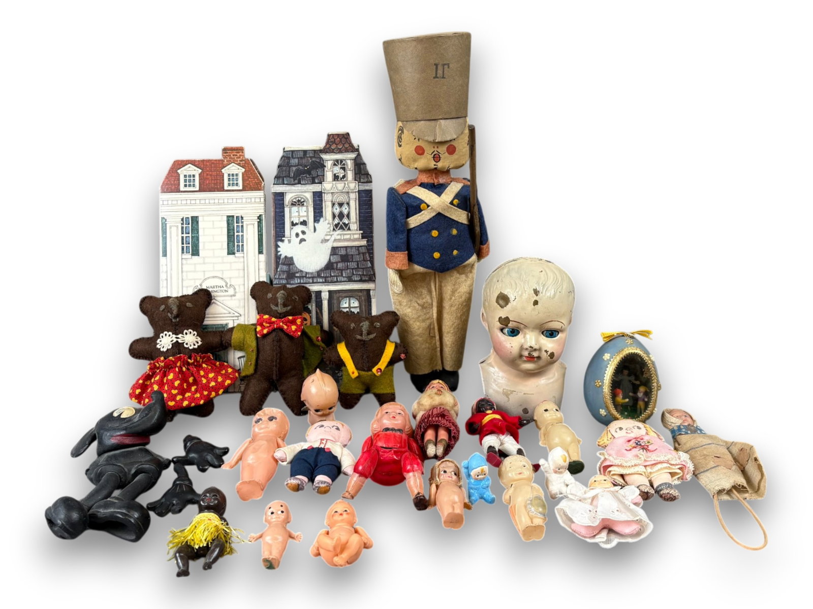 Misc. Dolls & Animals: Group of dolls and animals in celluloid, cloth, tin, and rubber, including damaged Mickey Mouse and Hallmark collectibles. Approx. 2 to 14 inches. Circa 1900-1980s. Shipping: Weiss Auctions offers