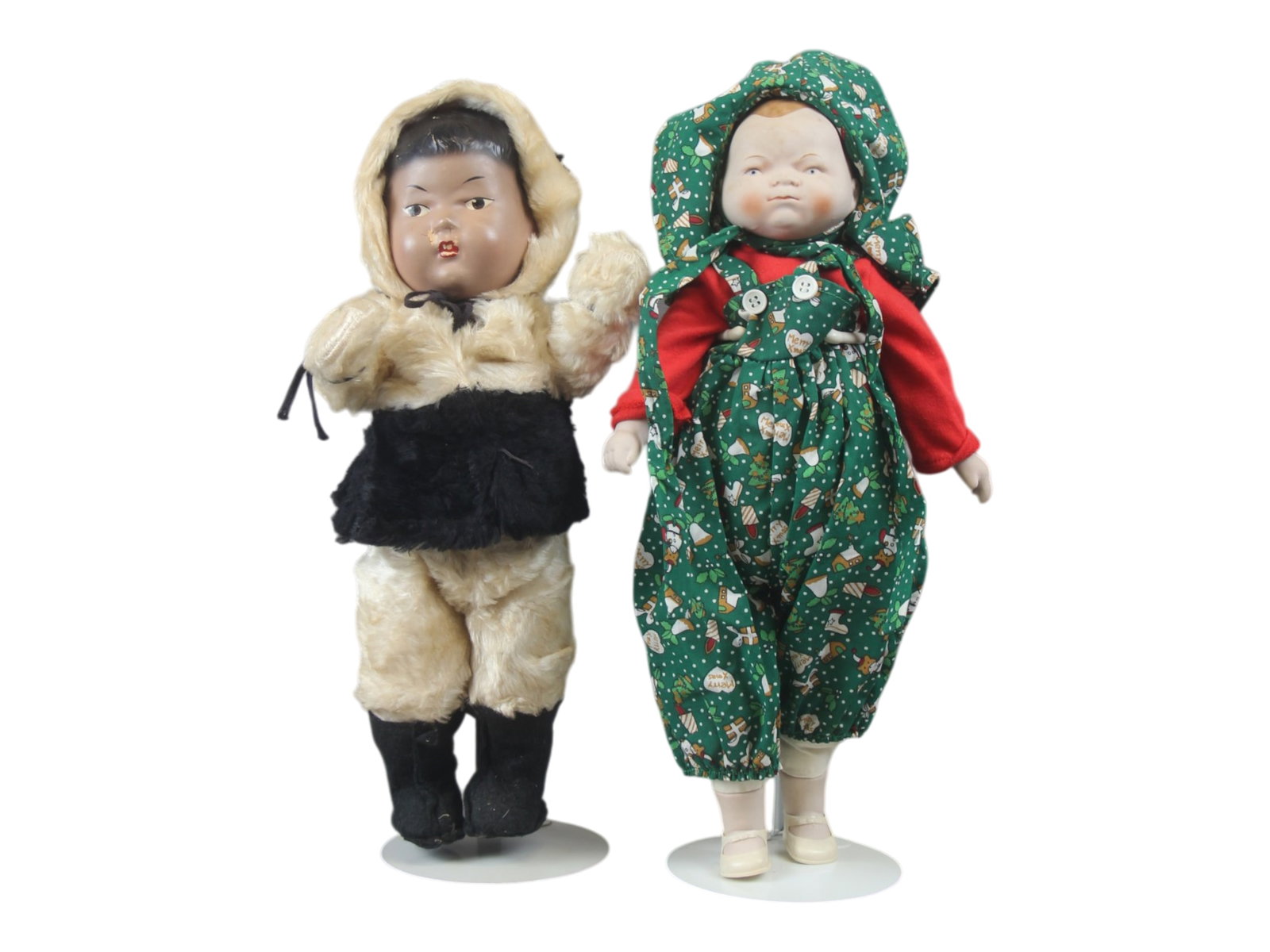 (2) Vintage Dolls: 14 inch Reliable Eskimo Clicquot Club Soda advertising doll, composition, in original costume, and a 15 inch bisque reproduction Bye-Lo in modern costume. Circa 1930s and 1980s. Shipping: Weiss