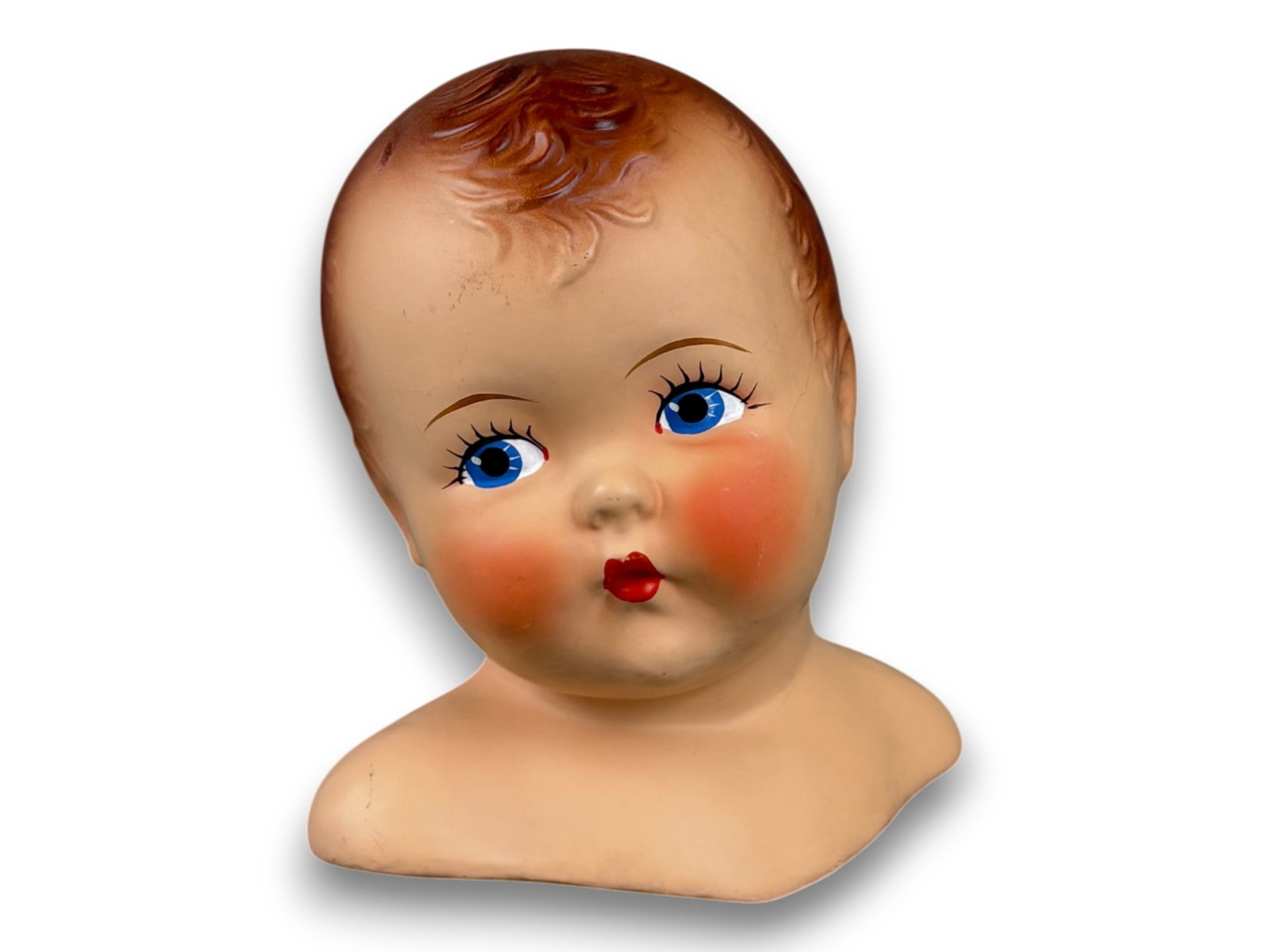 Baby Mannequin Head: 10 inch plastic baby mannequin head. Circa 1940s. Shipping: Weiss Auctions offers full-service, in-house shipping for nearly all items in this auction. For a shipping quote, please contact us prior to