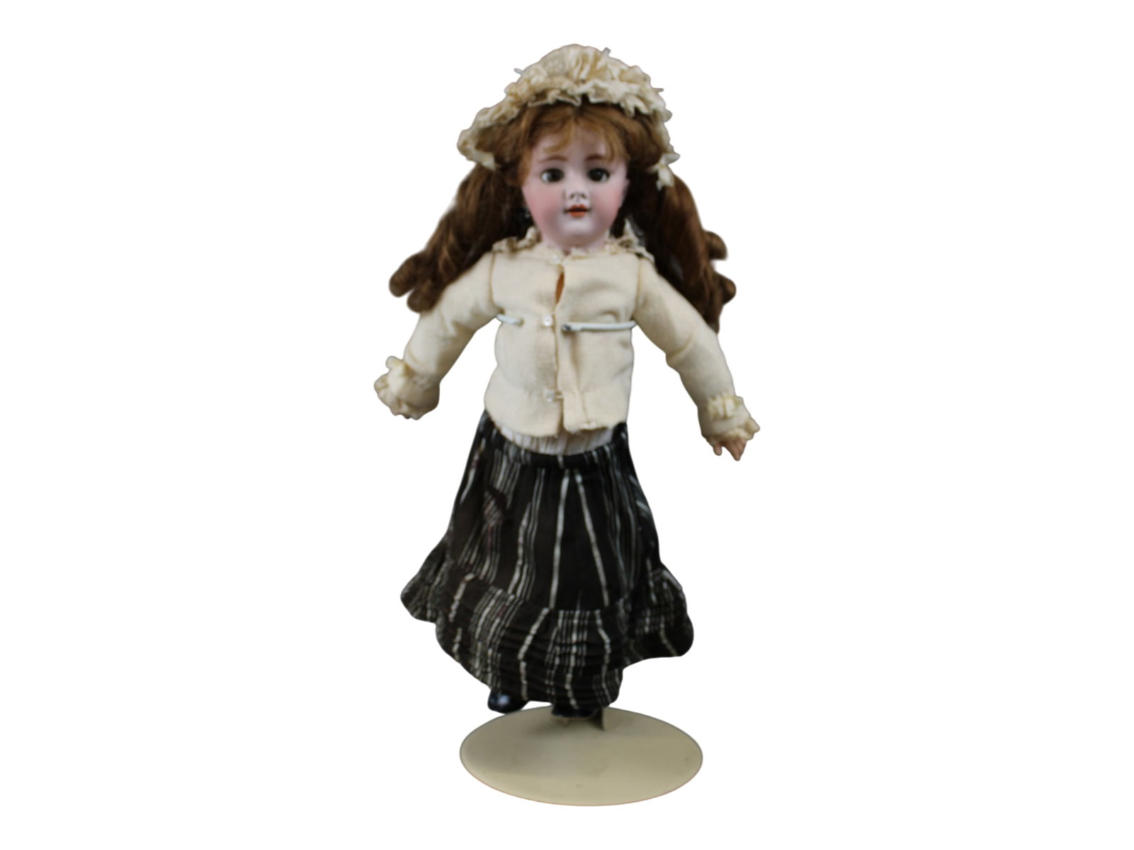 DEP French Doll: 20 inch DEP French bisque socket head doll on fully jointed composition body with original human hair wig and antique clothes. Circa 1899-1910. Shipping: Weiss Auctions offers full-service, in-house