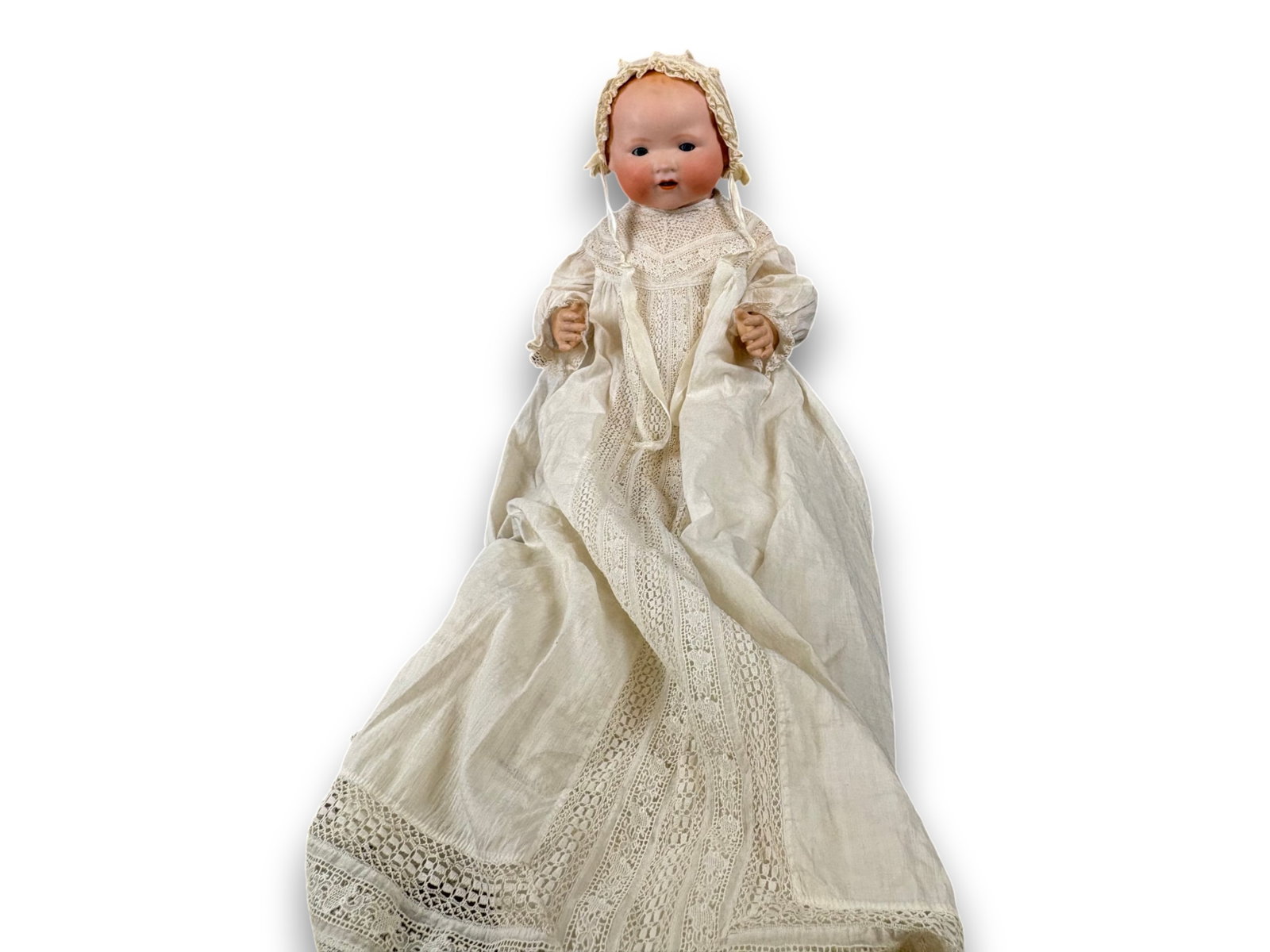 Armand Marseille 351 Baby Doll: 23 inch Armand Marseille #351 baby doll with bisque head on composition bent limb baby body. Open mouth with two lower teeth. Circa 1912. Shipping: Weiss Auctions offers full-service, in-house