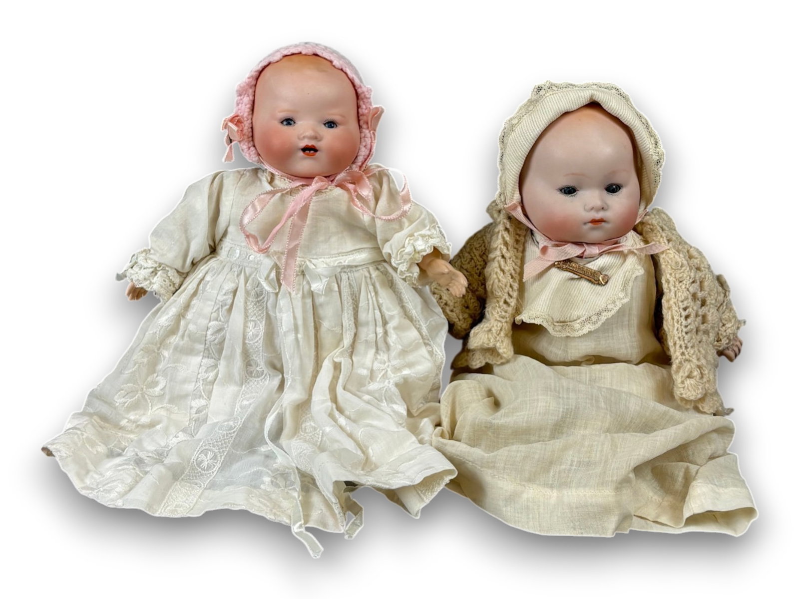 (2) Armand Marseille Baby Dolls: 10 inch Dream Baby and 11 inch Baby Phyllis, both with bisque flange heads on cloth bodies with composition hands. Circa 1920s. Shipping: Weiss Auctions offers full-service, in-house shipping for near