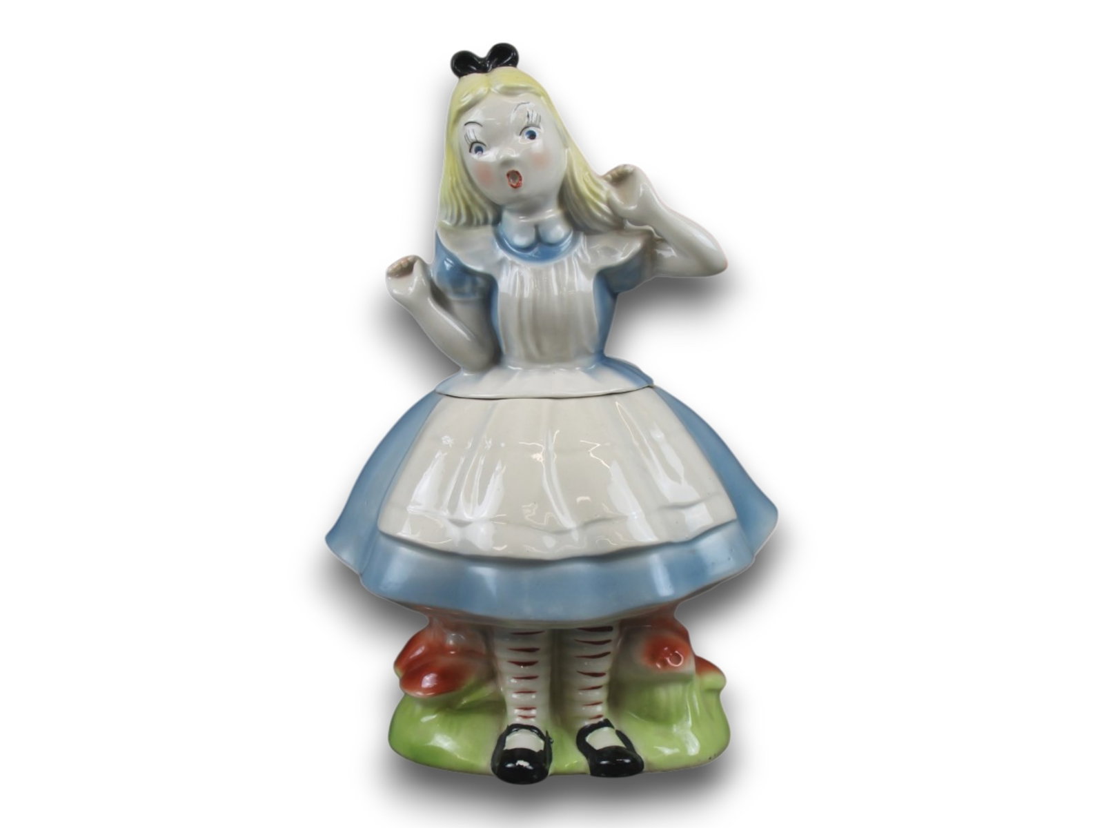 Regal China Alice in Wonderland Cookie Jar.: This jar, also known as "Frightened Alice" is very hard to find. This example is in great condition with no chips, cracks or crazing. Marked on base "Walt Disney Productions c Alice in Wonderland". Si