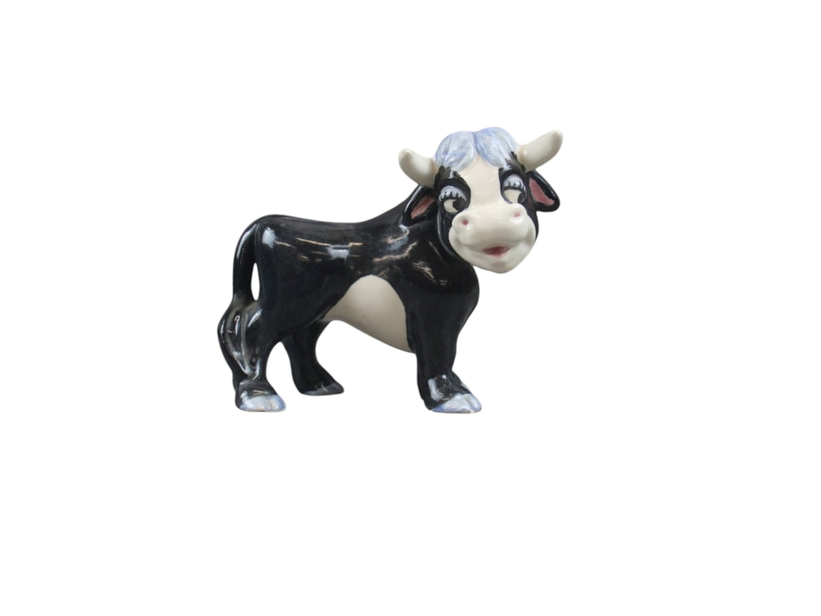 Brayton Laguna Ferdinand the Bull: 8 1/4 x 8 1/2" Porcelain figure circa 1938. Shipping: Weiss Auctions offers full-service, in-house shipping for nearly all items in this auction. For a shipping quote, please contact us prior to the s