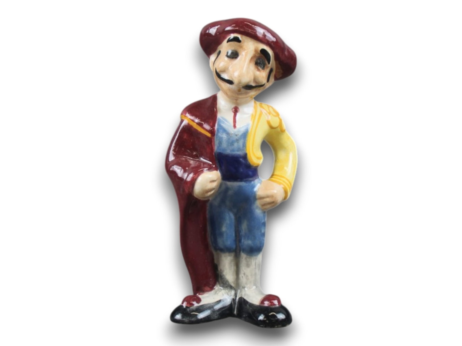 Brayton Laguna Matador Porcelain Figurine: This is the Larger example at 8.75" tall. Characters from this animated short are caricatures of various Disney personnel, most notably Walt Disney himself who is depicted here as the Matador. Shippin