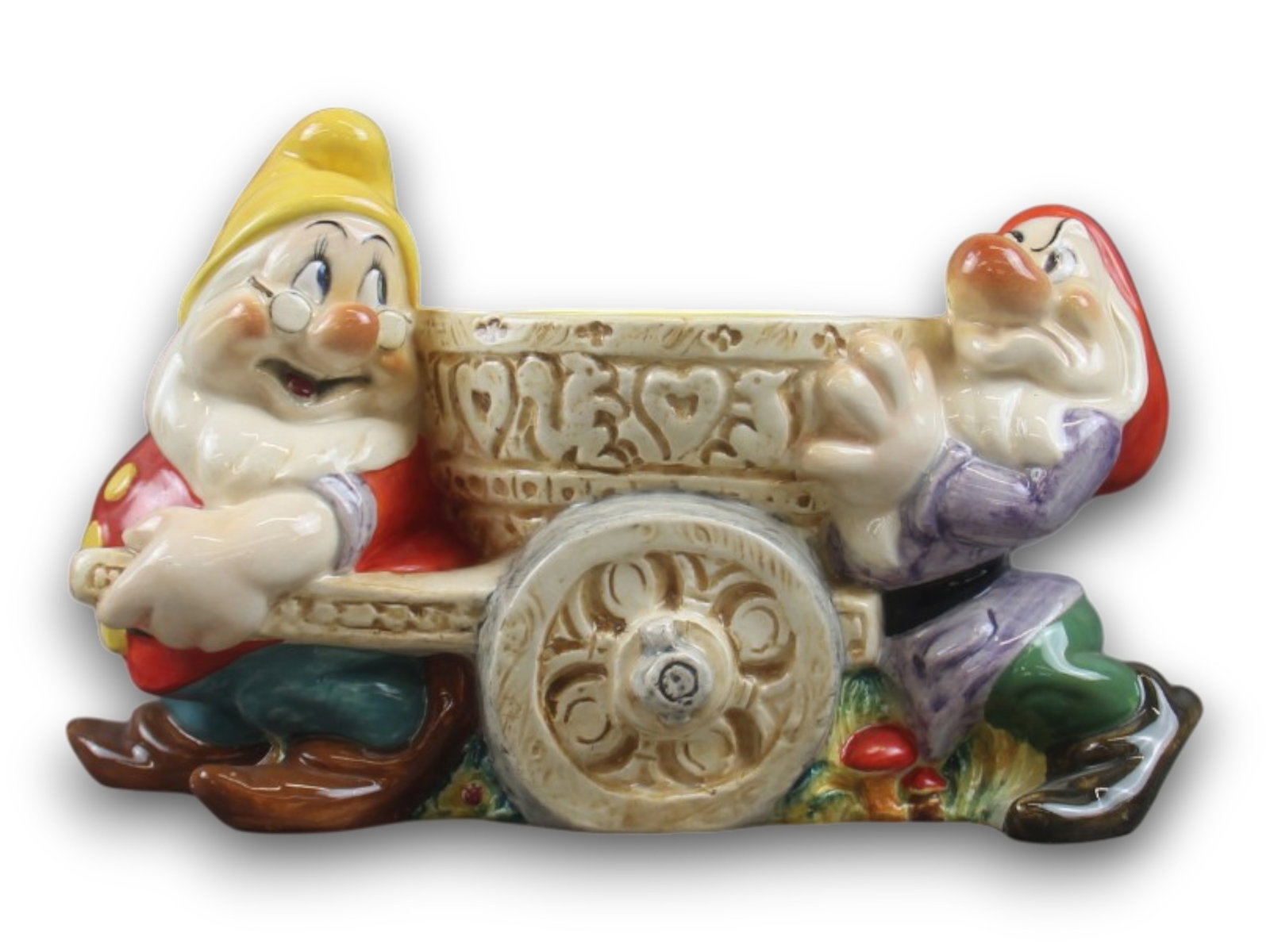 Rare Zaccagnini Doc and Grumpy Cart: Rare Porcelain piece, 11" long 7" tall. Very Scarce piece. Shipping: Weiss Auctions offers full-service, in-house shipping for nearly all items in this auction. For a shipping quote, please contact us