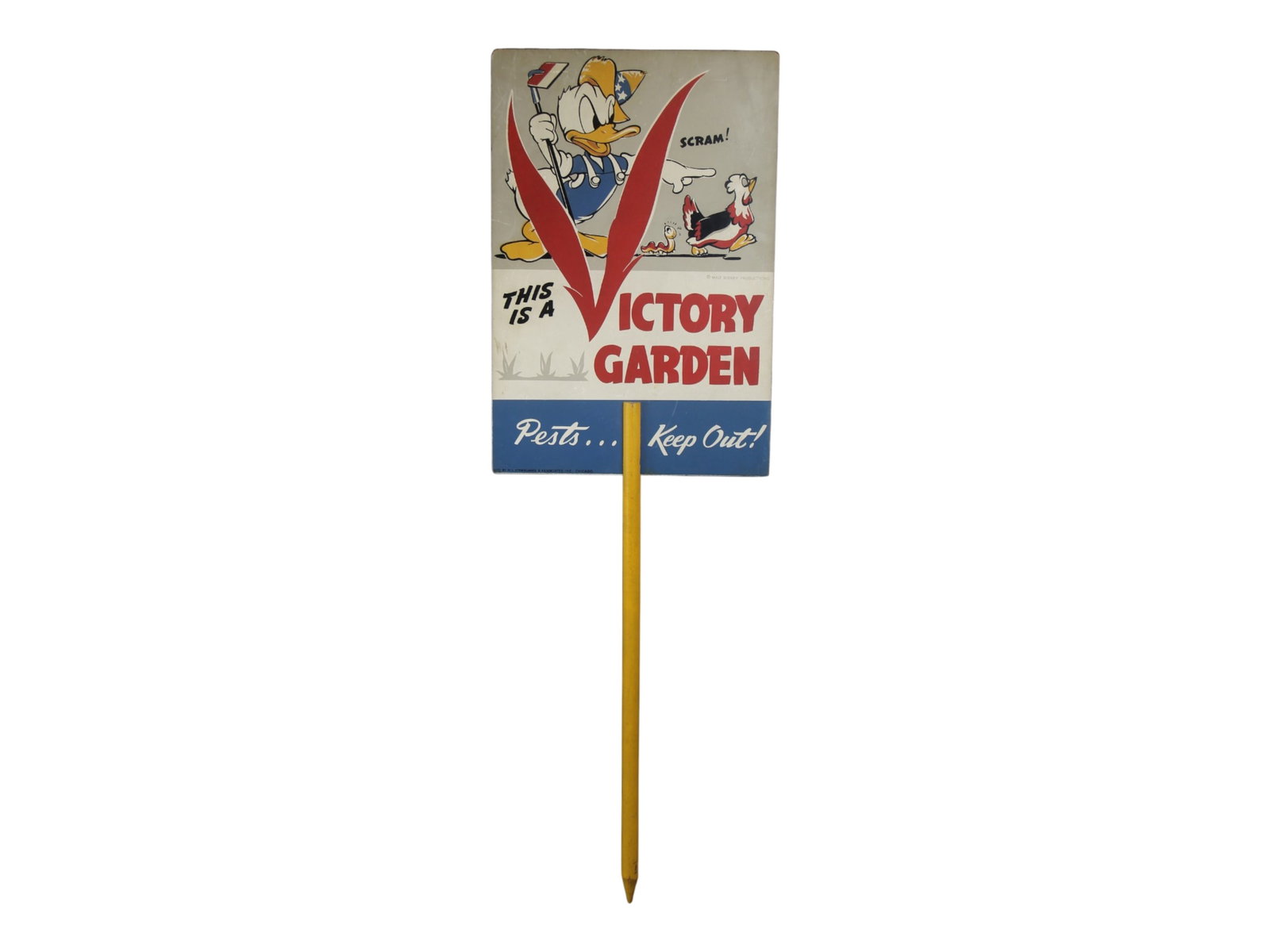 Donald Duck WWII Victory Garden Sign: Donald Duck WWII Victory Garden sign on board with light wear. Sign approx. 12'' x 18''. Rare piece for the Disney World War II collector. Approx. 37 1/2'' tall. Shipping: Weiss Auctions offers full-s