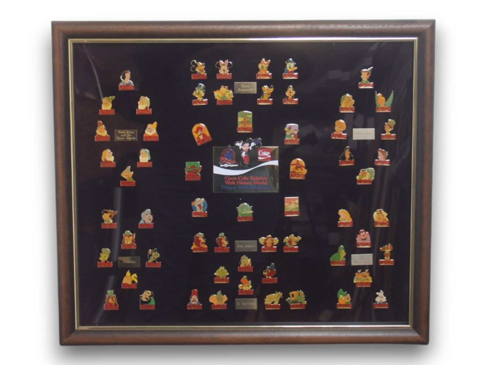 1986 Walt Disney World Coca Cola Pin Set of 60: Walt Disney World - 15th Anniversary Coca-Cola Pin Set Group of 60 (Walt Disney, 1986). To celebrate the 15th anniversary of Walt Disney World, Coca-Cola created this sensational pin set featuring man