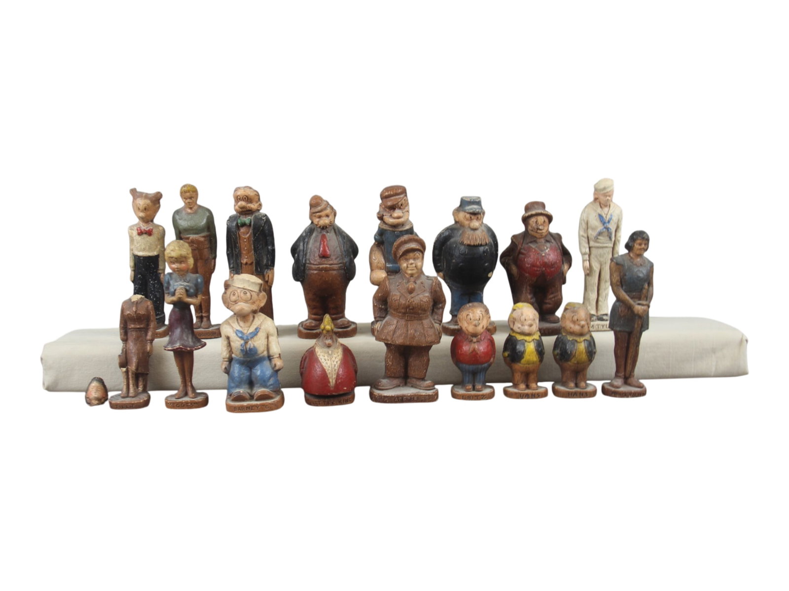 1940's Grouping of Syroco Figures, King Features: Circa 1940's, King Features Syndicate. Nice grouping of Syroco figures. Includes: Popeye, Wimpy, Barney Google, Jiggs, Dagwood, Flash Gordon, Prince Valiant, Archie, Toots, Casper, The Captain, Little