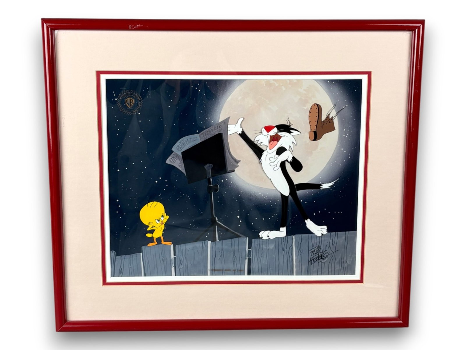 Friz Freleng, Signed Ltd Ed Cel "La Traviata": (Warner Brothers, 1992) Hand painted limited edition cel titled "La Traviata" featuring Sylvester and Tweety. Hand signed by Friz Freleng, and Warner Bros. seal at upper left corner. Color lithographe