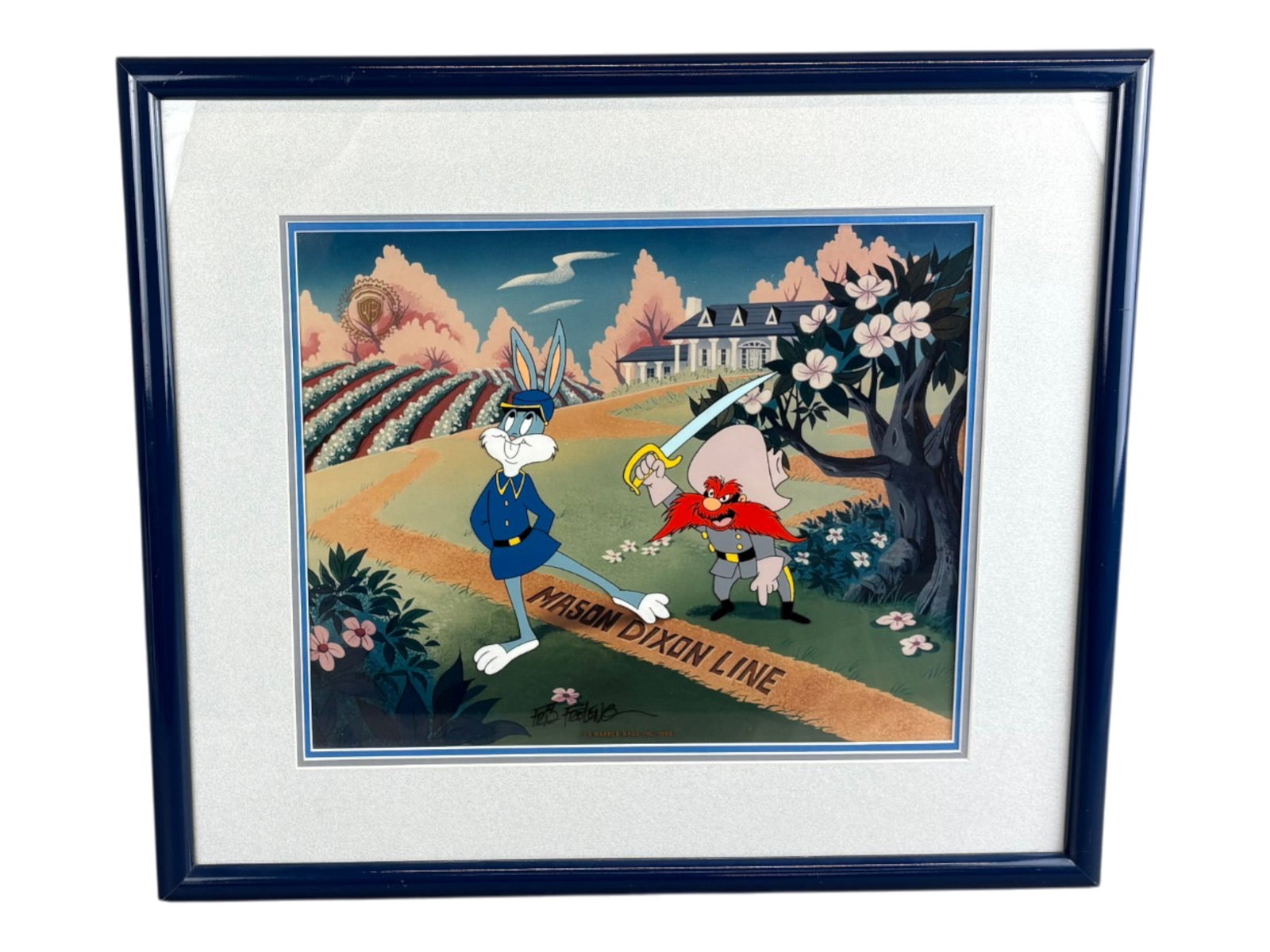 Friz Freleng, Signed Ltd Ed Cel, Mason Dixon Line: (Warner Brothers, 1992) Hand painted limited edition cel titled "Mason Dixon Line" featuring Bugs Bunny and Yosemite Sam. Hand signed by Friz Freleng, and numbered faintly 118/750. Color lithographed 