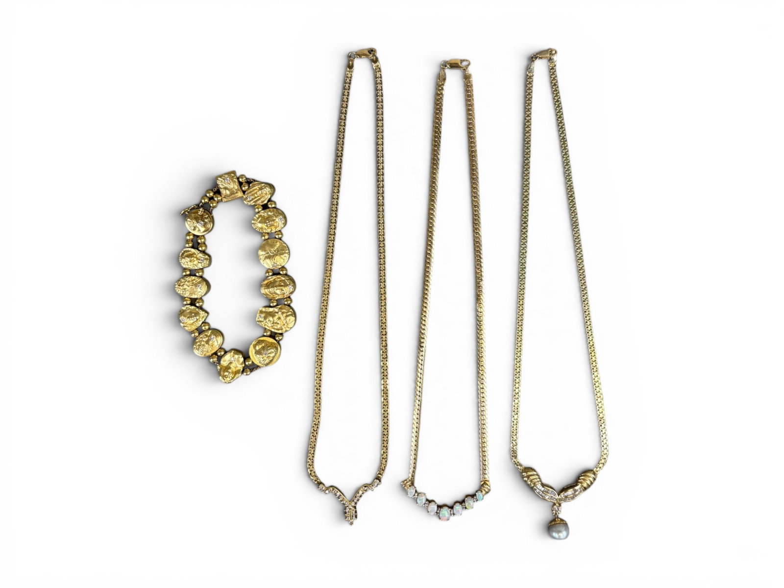 (4) Gold Necklaces & Bracelet Group: Group of four gold jewelry pieces including (i) a 14K yellow gold necklace with Tahitian drop pearl pendant, the pearl measuring approximately 9 millimeters, light gray in color, set with