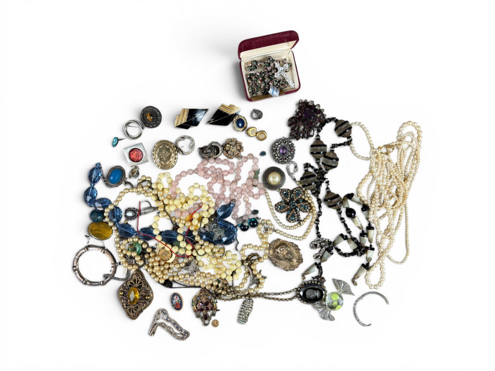 Estate Silver & Gold Jewelry Group: Estate jewelry lot including costume jewelry, silver jewelry weighing 153 grams, and a mismatched pair of 14 karat yellow gold earrings weighing 1.1 grams. Offered on behalf of the New York County