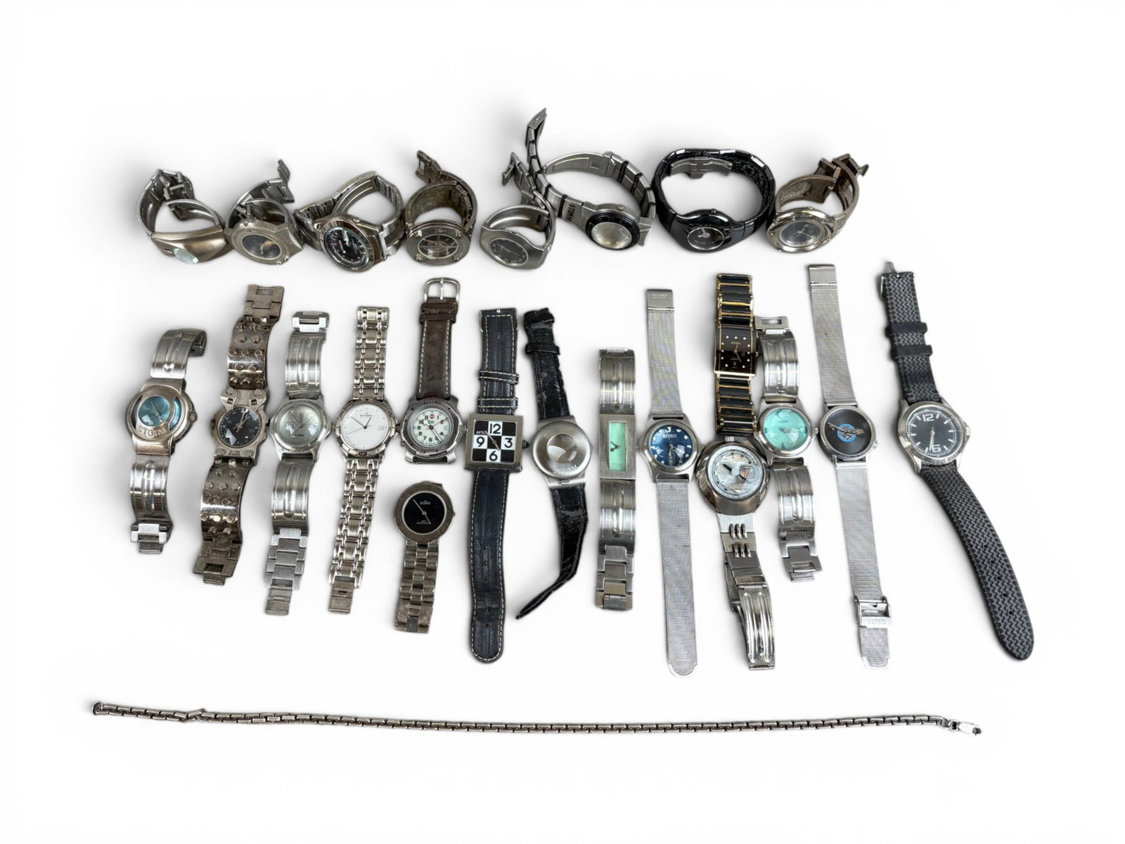 Estate Watches & Sterling Chain: Estate lot including 23 assorted ladies' and men's wristwatches together with a sterling silver chain weighing 63.5 grams. Offered on behalf of the New York County Public Administrator's Office from