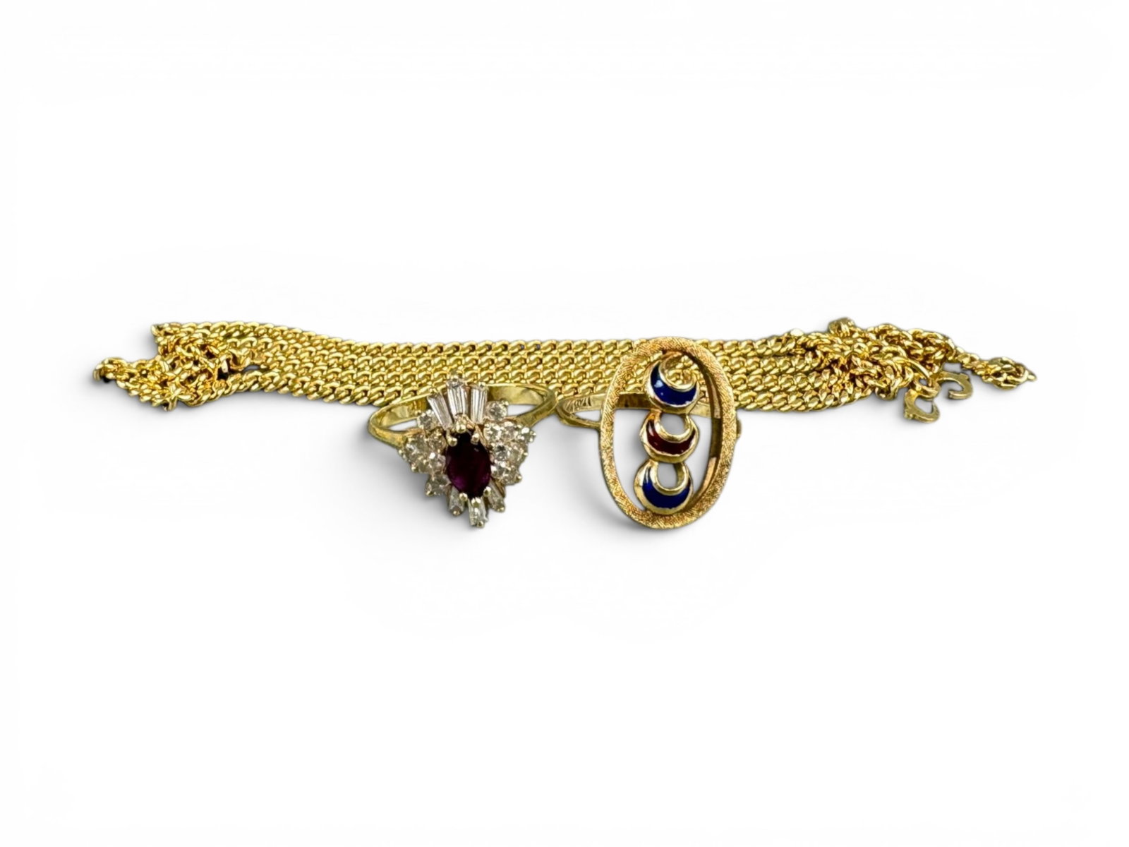 (3) 18K Gold Jewelry Items: Estate jewelry lot consisting of three pieces of 18 karat gold jewelry with a combined weight of 26.4 grams. Offered on behalf of the New York County Public Administrator's Office from the estate of I