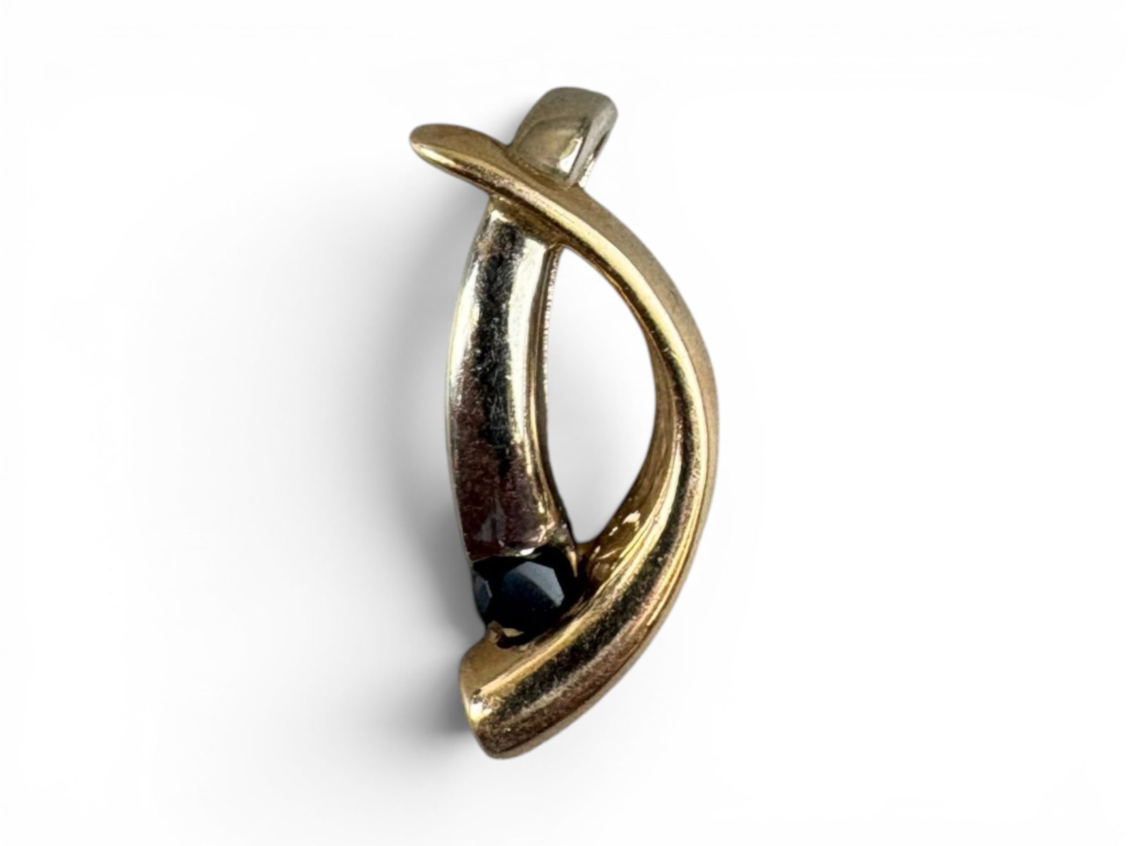14K Two-Tone Onyx Pendant: Two-tone 14K gold pendant set with black onyx stone. Total weight approximately 8.8 grams. Shipping: Weiss Auctions offers full-service, in-house shipping for nearly all items in this auction. For a s
