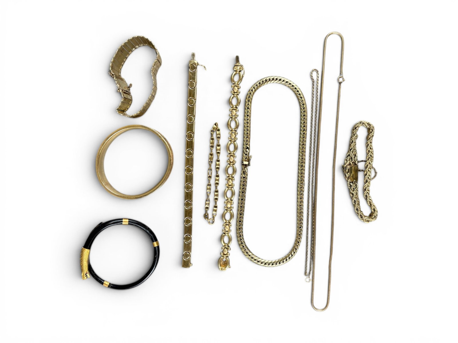 14K Gold Jewelry Group: Estate lot consisting of assorted 14 karat gold jewelry items with a combined weight of approximately 130 grams. Offered on behalf of the New York County Public Administrator's Office from the estate 