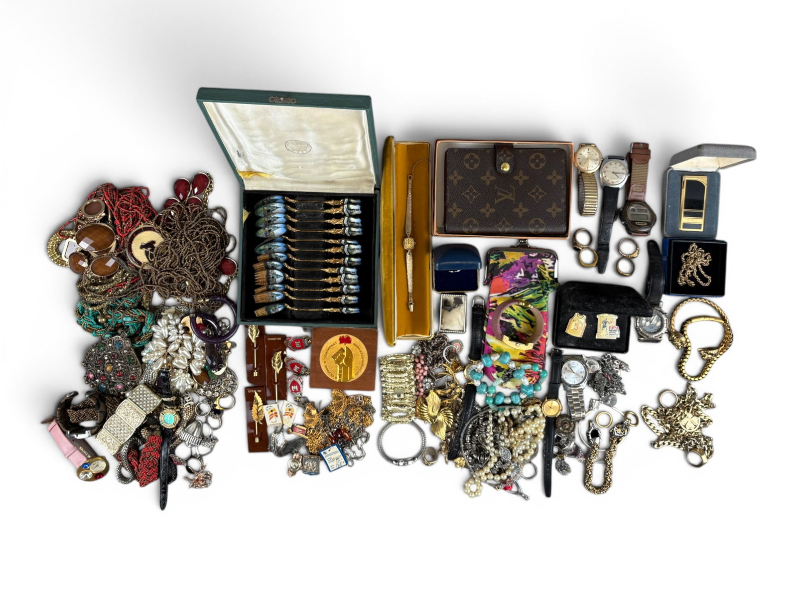 Assorted Jewelry Group: Assorted jewelry including rings, watches, necklaces, earrings, bracelets, some in gold and silver along with costume pieces and a variety of trinkets. Examine! This lot is being offered on behalf of