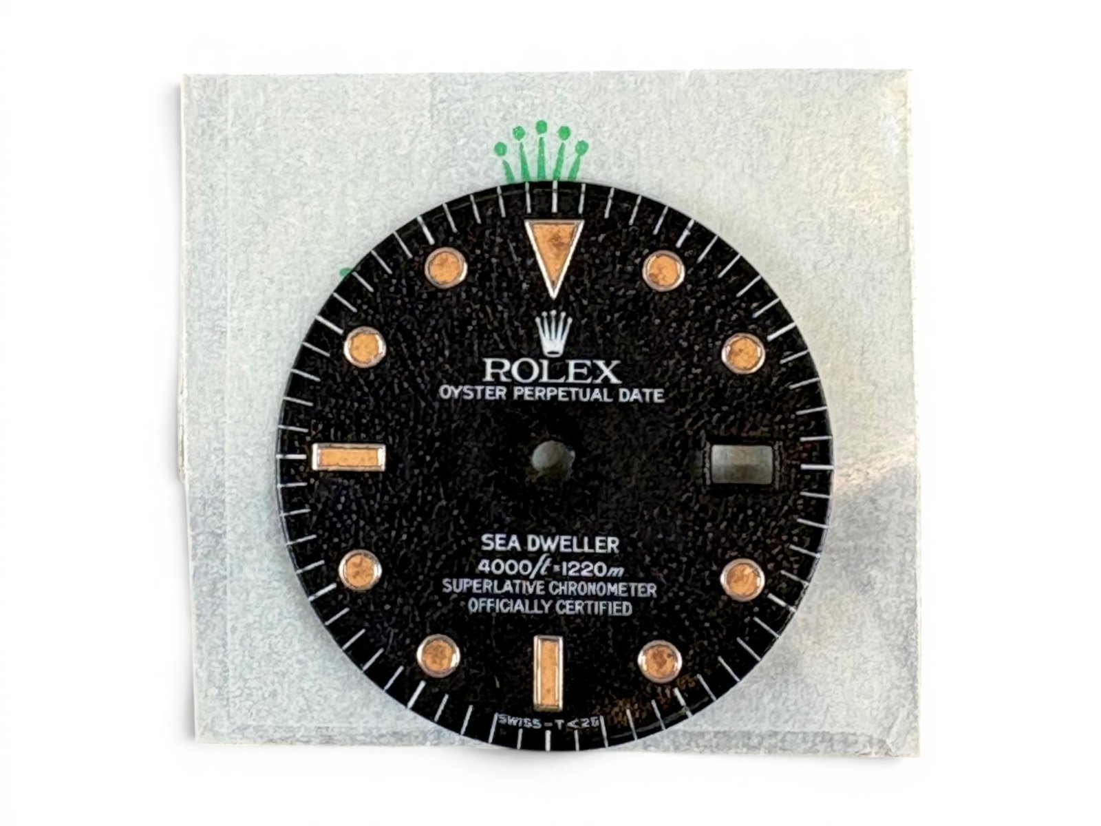 Rolex Factory Sea-Dweller 16600 Dial: Factory original Rolex Sea-Dweller dial, reference 16600, circa 1980, marked 4000ft/1220m, glossy with radium plots (not glowing). Rare tropical spider dial. Includes original glassine bag. Shipping: 