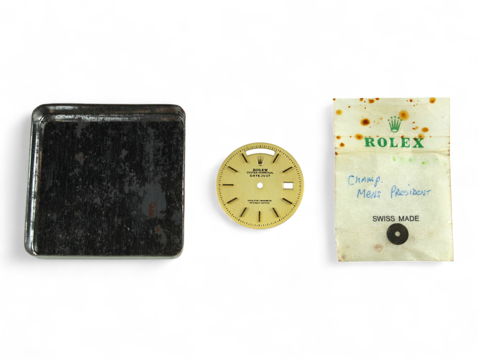 Rolex Datejust Dial in Tin: Rolex Oyster Perpetual Datejust dial in Rolex parts tin, tin missing lid. Approx. 28.3mm diameter. Shipping: Weiss Auctions offers full-service, in-house shipping for nearly all items in this