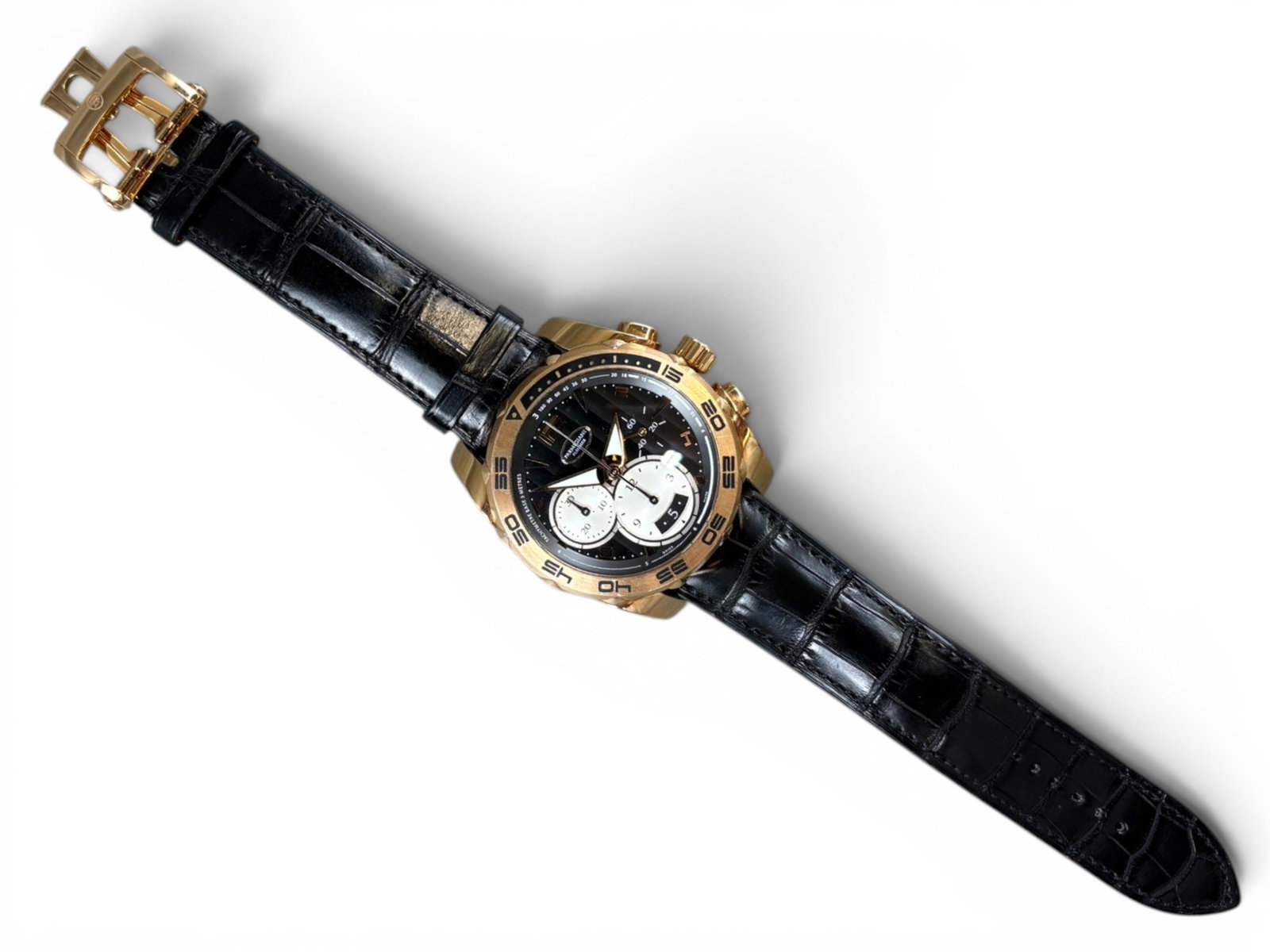 Parmigiani 18 K Pershing Chronograph Watch: Reference #38912b with Hermes Band Shipping: Weiss Auctions offers full-service, in-house shipping for nearly all items in this auction. For a shipping quote, please contact us prior to the sale at
