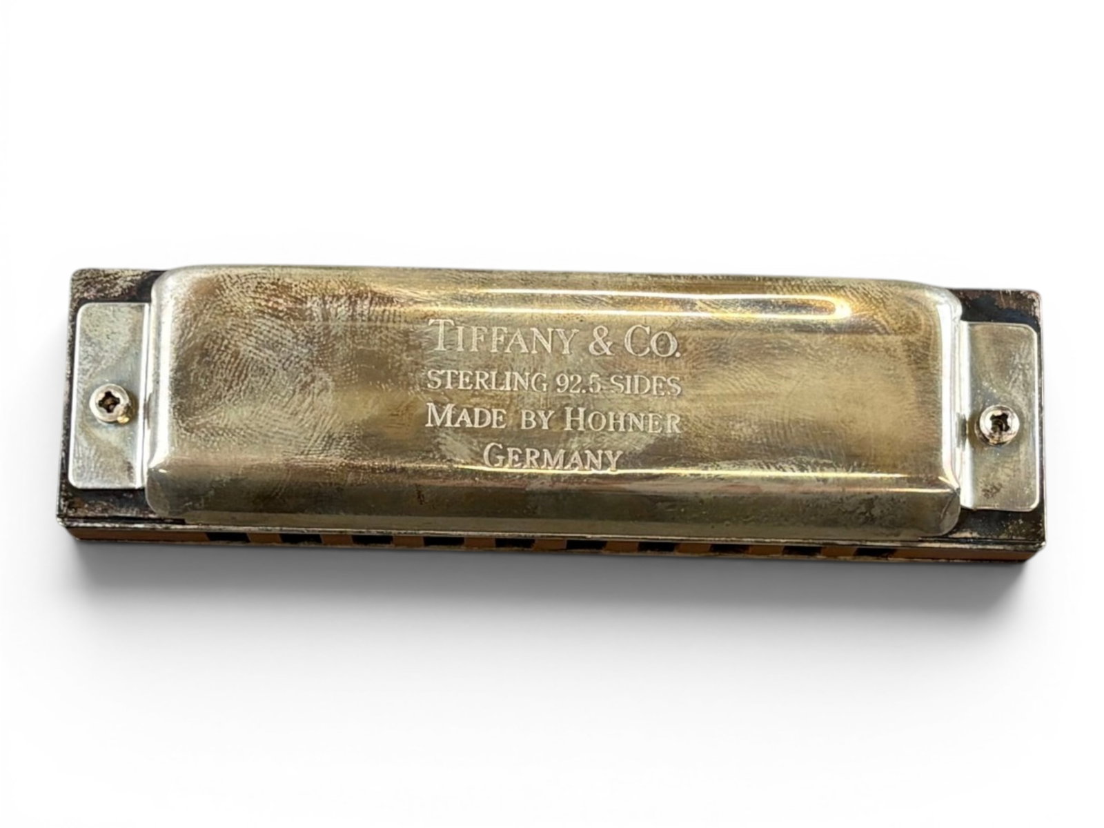 Tiffany & Co. Sterling Silver Hohner Harmonica: Tiffany & Co. Sterling Silver Hohner Harmonica in original Tiffany & Co. black velveted box. Shipping: Weiss Auctions offers full-service, in-house shipping for nearly all items in this auction. For