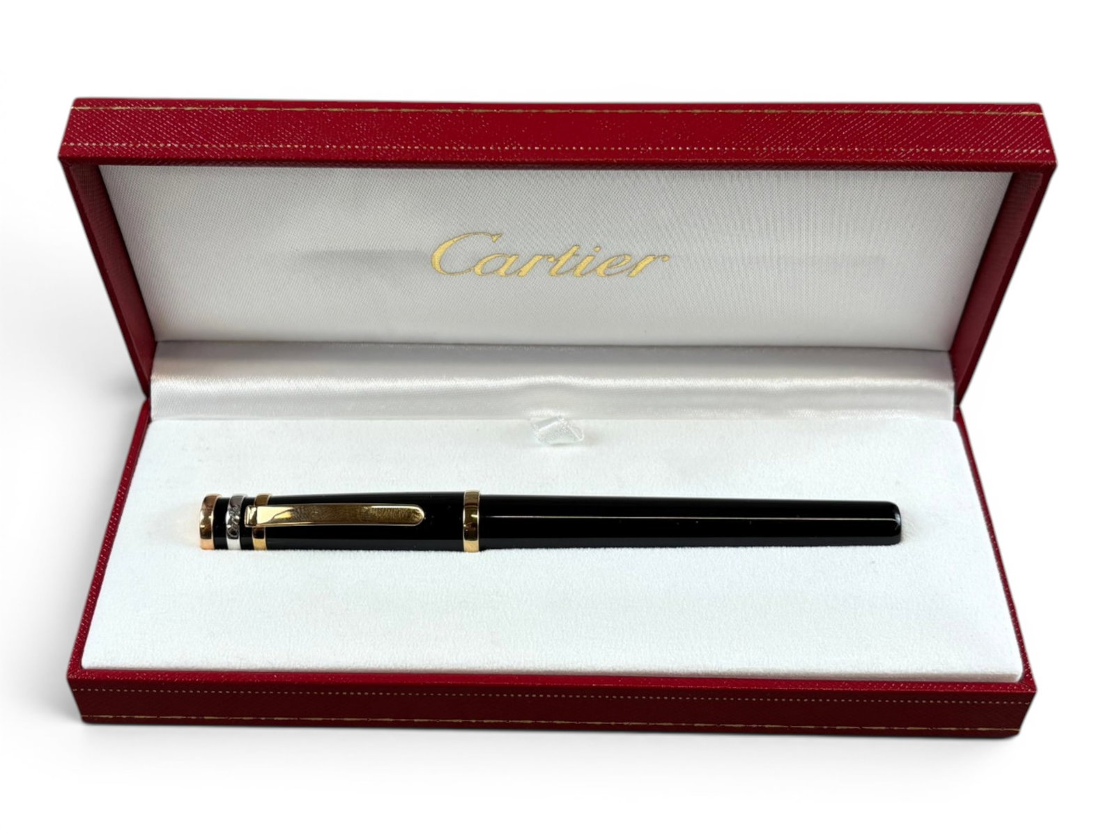 Cartier Fountain Pen: Cartier Fountain Pen with 18k gold nib. In original box. With converter and paperwork. Shipping: Weiss Auctions offers full-service, in-house shipping for nearly all items in this auction. For a