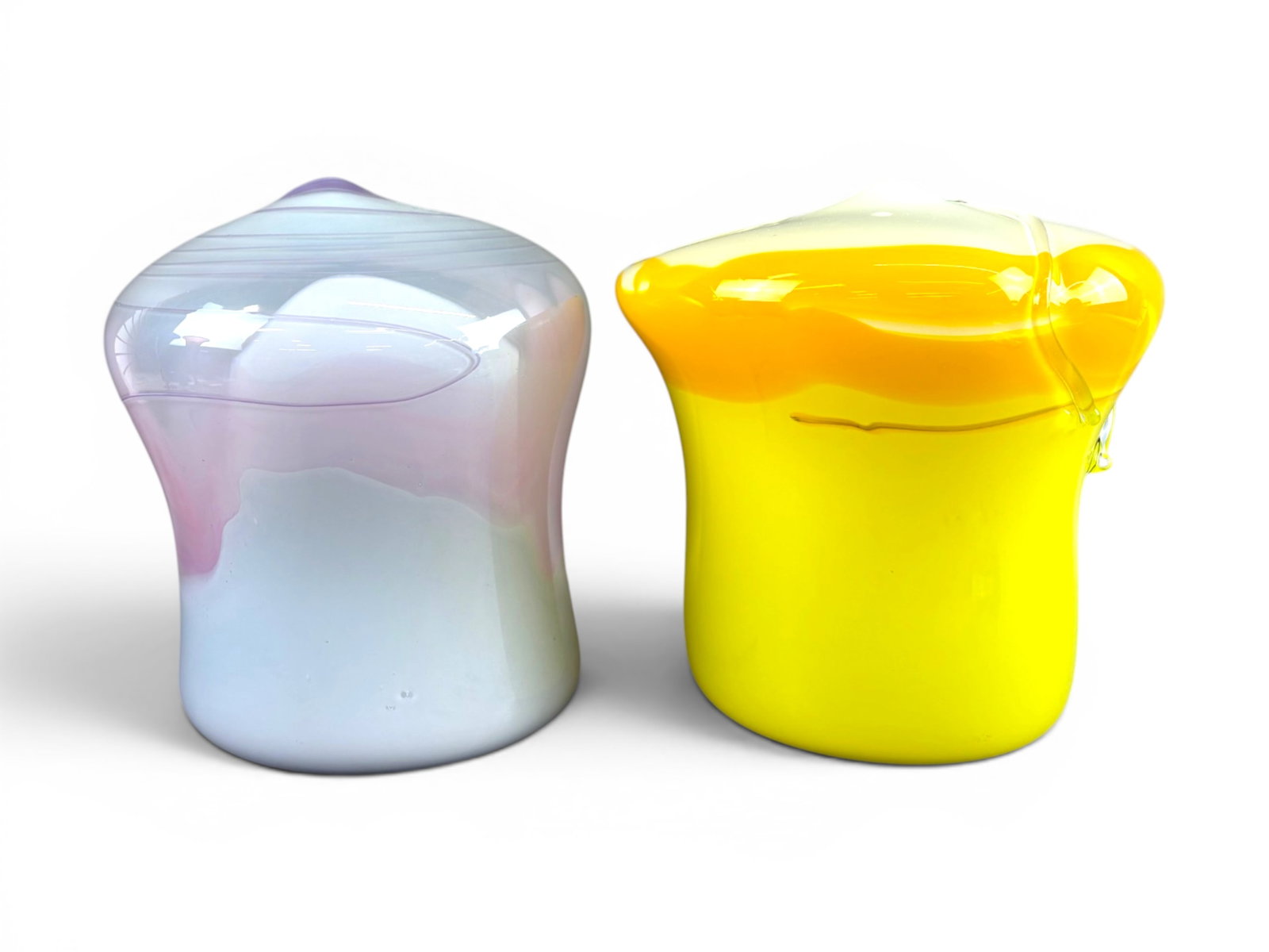 (2) Vernon Brejcha "Fertility" Glass Vases: Pair of Vernon Brejcha "Fertility" art glass vases featuring sculptural organic forms with applied looping and pulled glass decoration. One example in vibrant yellow and white tones with clear applied