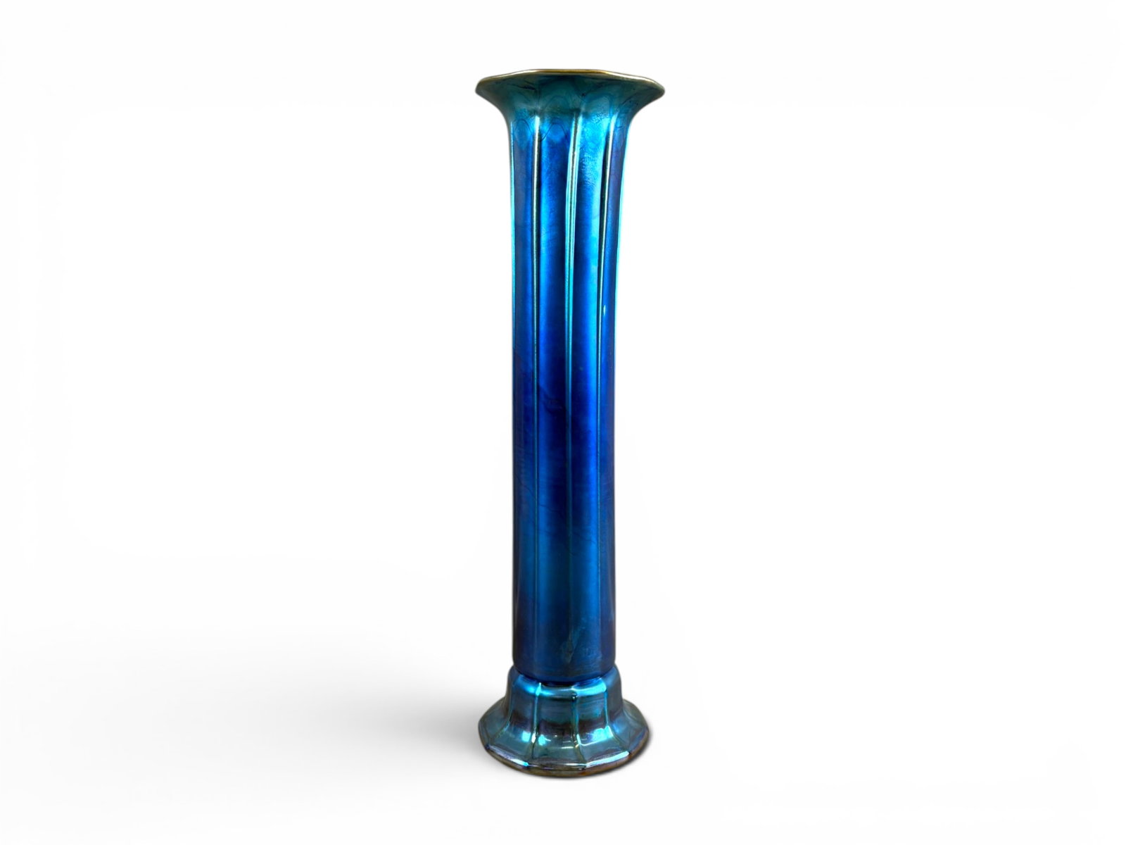 Louis Comfort Tiffany Blue Iridescent Vase: Louis Comfort Tiffany Studios Favrile art glass vase in a rich blue iridescent finish with vertically ribbed body, flared trumpet-form rim, and paneled foot. Signed and inscribed to underside "Louis