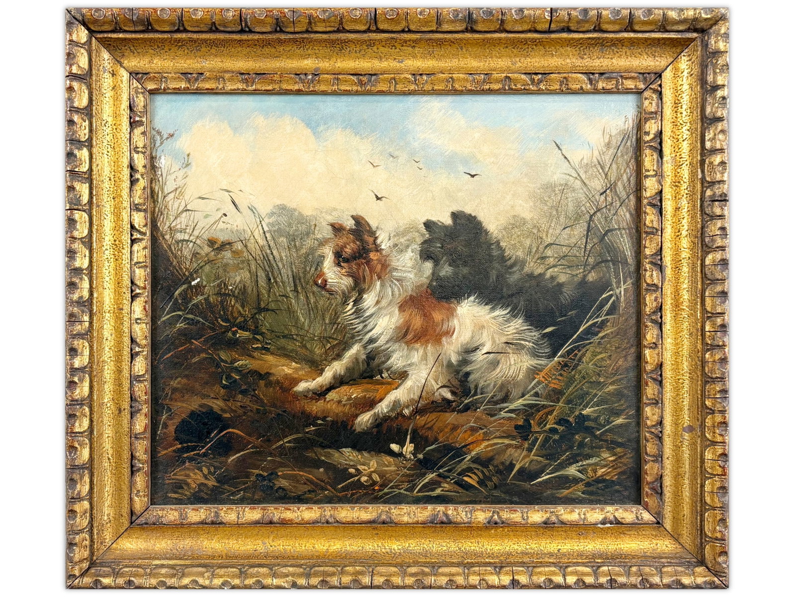 19th Century Oil on Canvas, Terriers Landscape: 19th century oil on canvas depicting two terrier-type dogs in a naturalistic outdoor setting, poised alert among grasses with birds overhead. Unsigned. Executed in the English sporting tradition with 