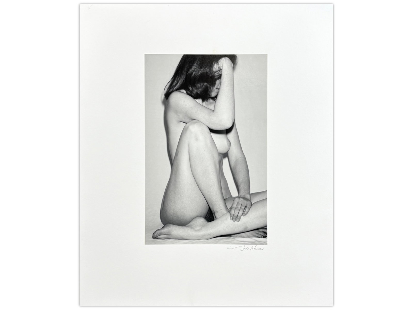 Jeff Nixon Signed Photo, "Nude, Yosemite Valley": Jeff Nixon (American, 1952-2022). Unframed gelatin silver print, "Nude N-29, Yosemite Valley". Pencil signed lower right under image. Sight seen approx. 6-1/4" x 9-3/8". Print is mounted to mat, and
