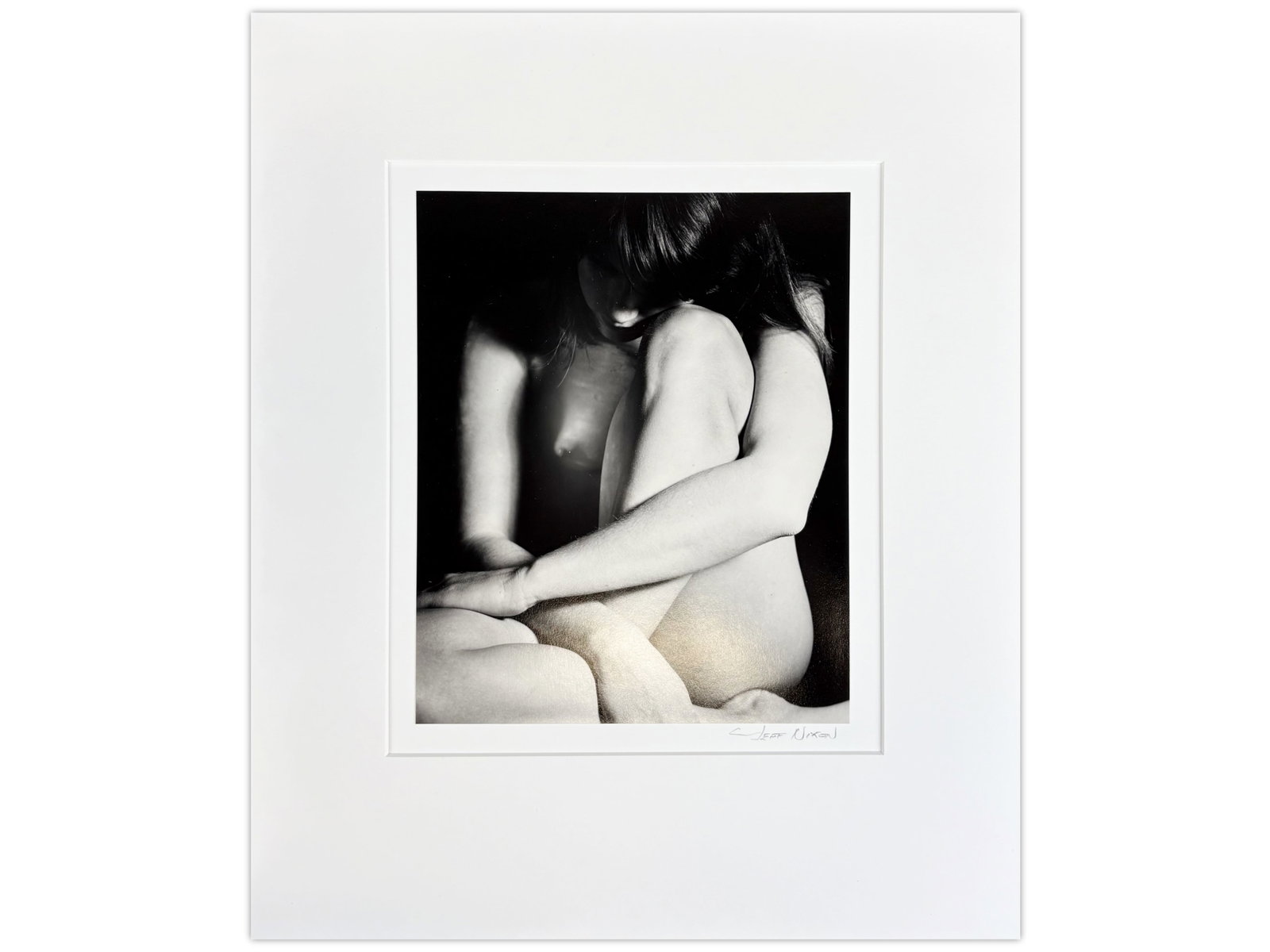 Jeff Nixon Signed Photo, "Nude #4, Yosemite": Jeff Nixon (American, 1952-2022). Unframed gelatin silver print, "Nude #4, Yosemite". Pencil signed lower right under image. Sight seen approx. 7-1/4" x 9-1/8". Print is mounted and matted with 13" x 