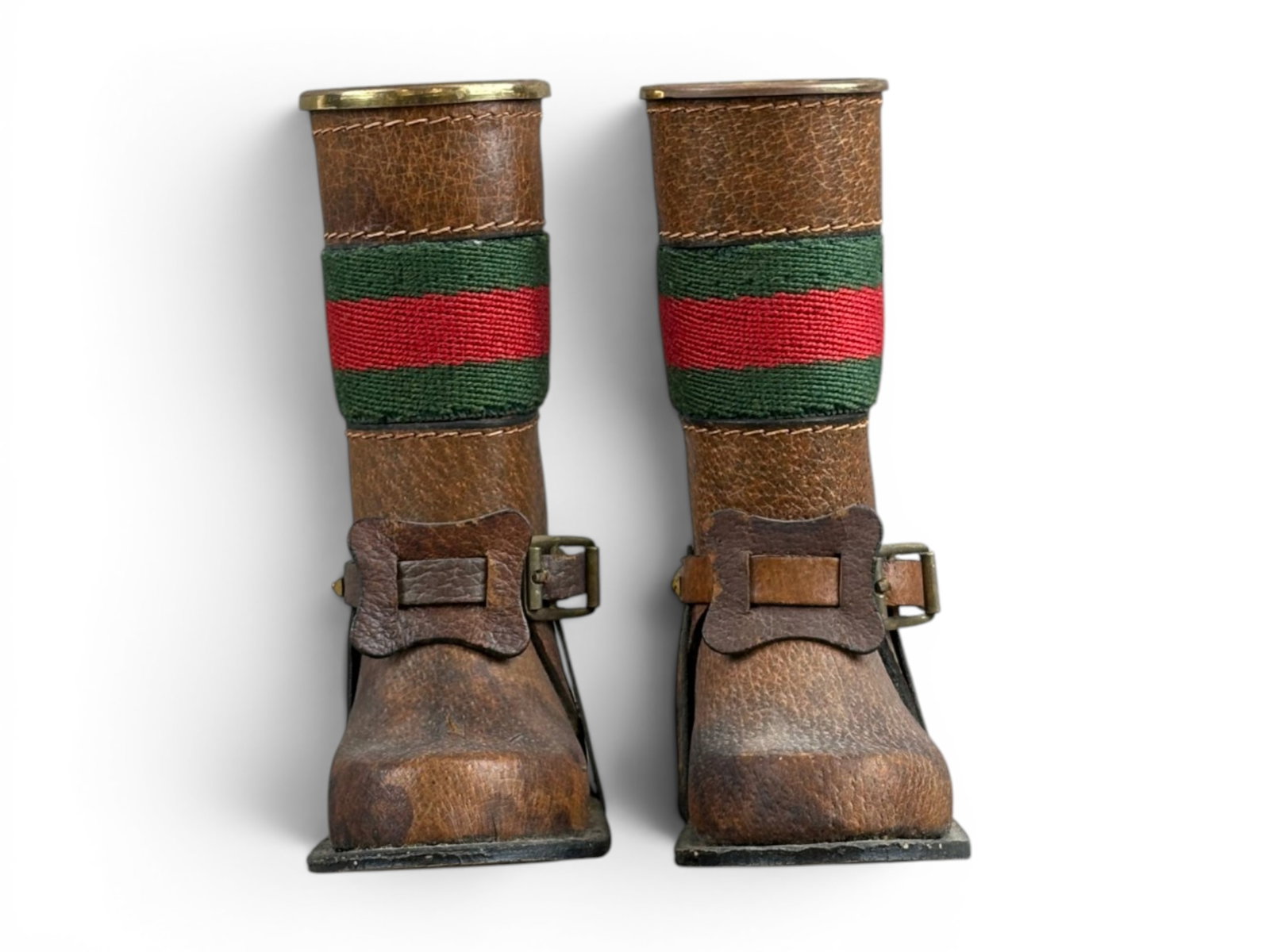 Pair of Gucci Leather Boot Matchstick/Pen Holders: Circa 1970's. Bottom of each marked "Made in Italy by Gucci". Each approx. 5-1/4" x 3-3/4". Both show surface wear with scuffing and edge wear. Shipping: Weiss Auctions offers full-service, in-house s