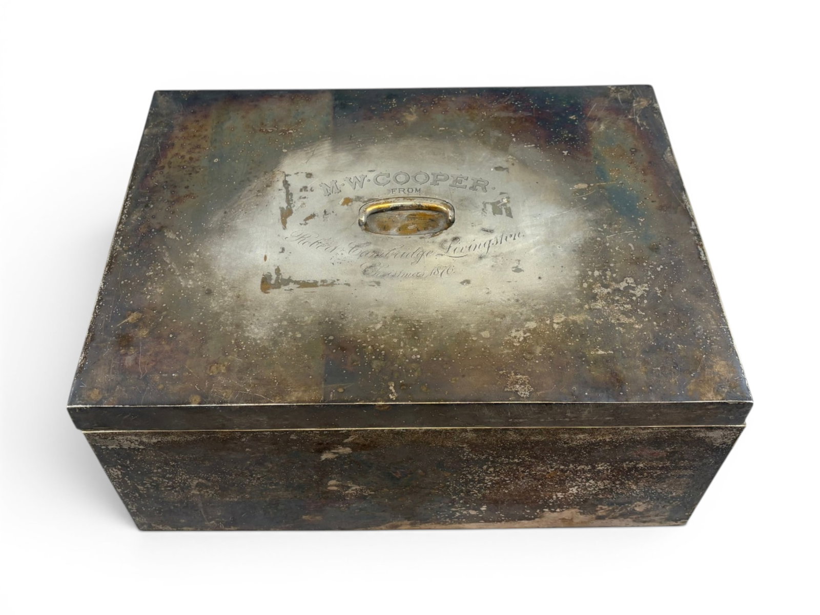 Tiffany & Co Sterling Silver Presentation Desk Box: Large Tiffany & Co. sterling silver presentation desk box with hinged lid and recessed handle. Lid engraved "M.W. Cooper from Robert Cambridge Livingston, Christmas 1876." Interior incised "TIFFANY &