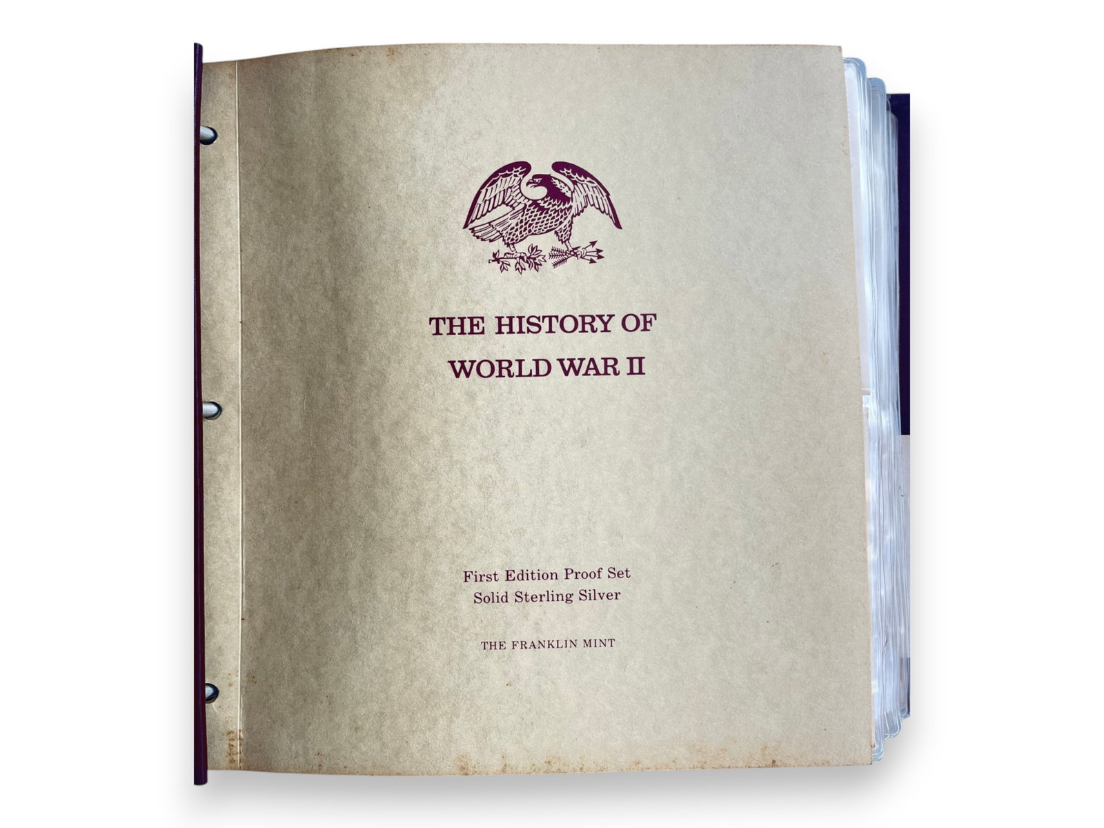 Franklin Mint WWII Silver Proof Set: Complete Franklin Mint "History of World War II" sterling silver proof medal set of 50 pieces mounted on descriptive cachet covers. Original binder and Certificate of Authenticity included. Shipping: