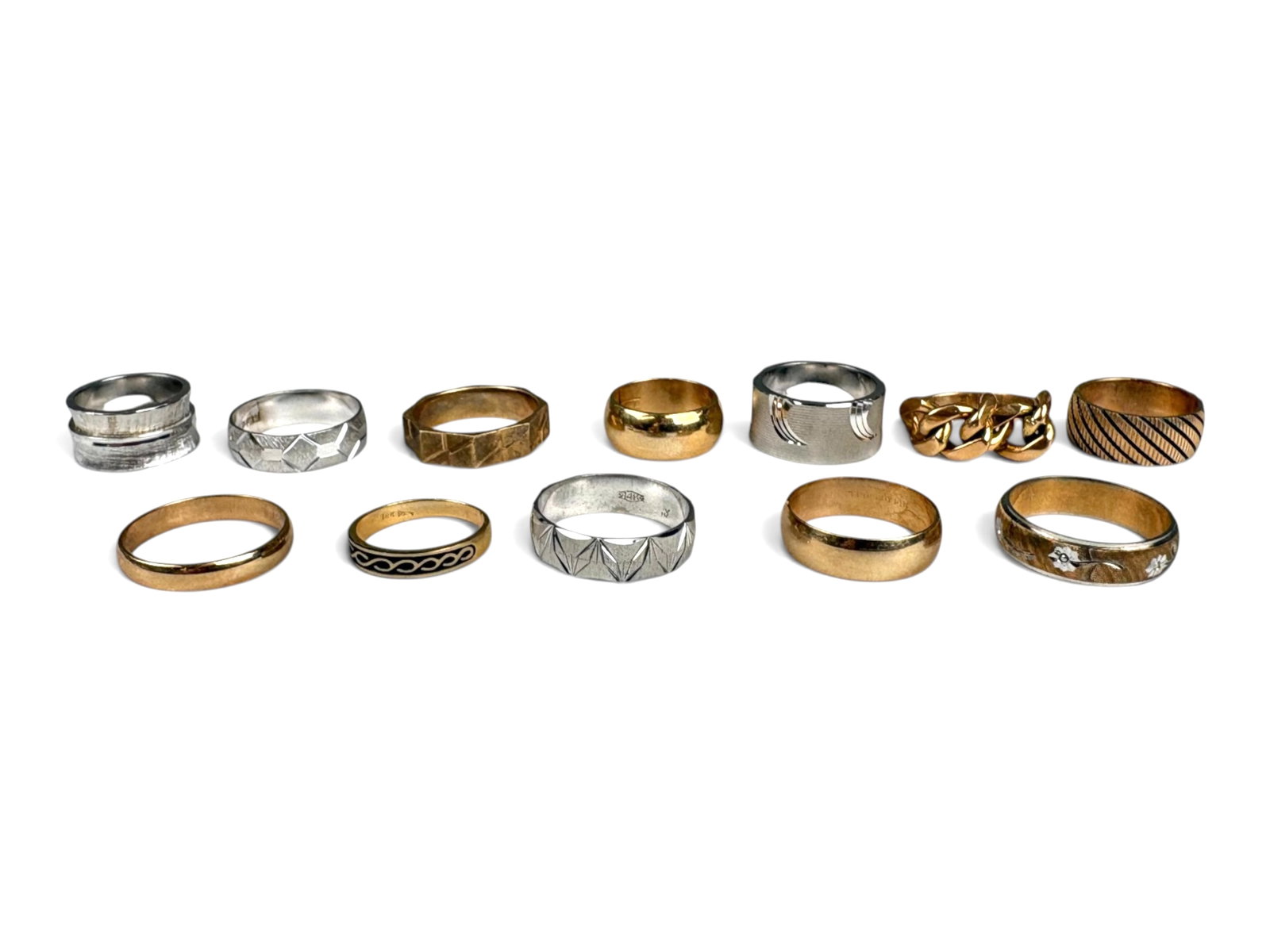 (12) 14K Gold Rings: (12) 14K gold rings in various designs and sizes. Total weight approximately 76.6 grams.This lot is being offered on behalf of the Kings County Public Administrators Office from the Estate of Michael 