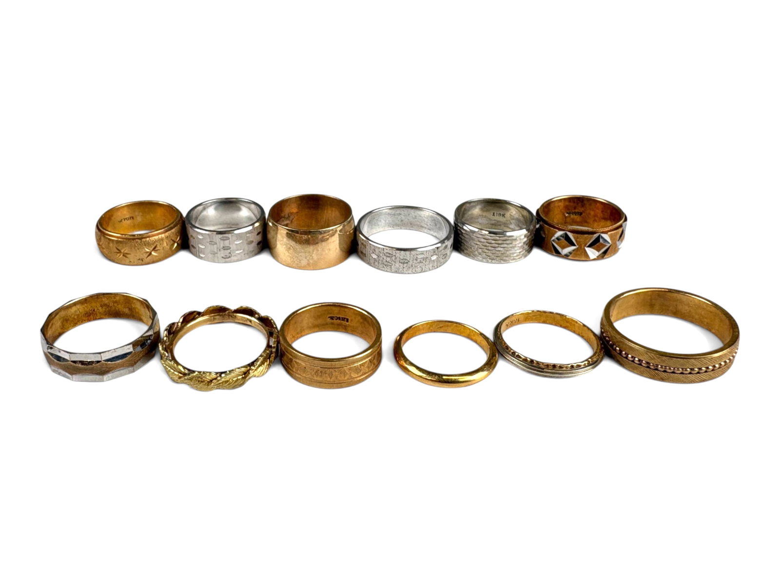 (12) 18K Gold Rings: (12) 18K gold rings in various designs and sizes. Total weight approximately 72.4 grams.This lot is being offered on behalf of the Kings County Public Administrators Office from the Estate of Michael 