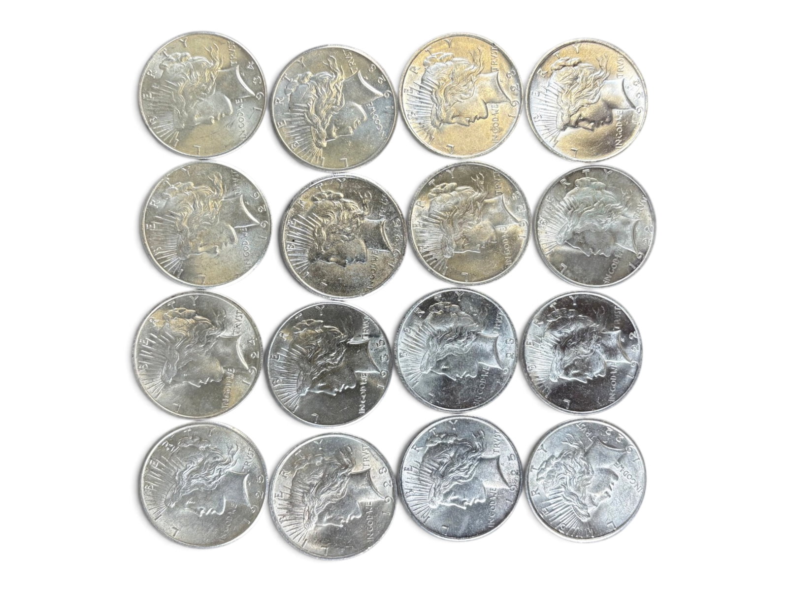 (16) High Grade Peace Dollars: Group of (16) high grade Peace dollars. Ungraded. See images for condition. Shipping: Weiss Auctions offers full-service, in-house shipping for nearly all items in this auction. For a shipping quote, 