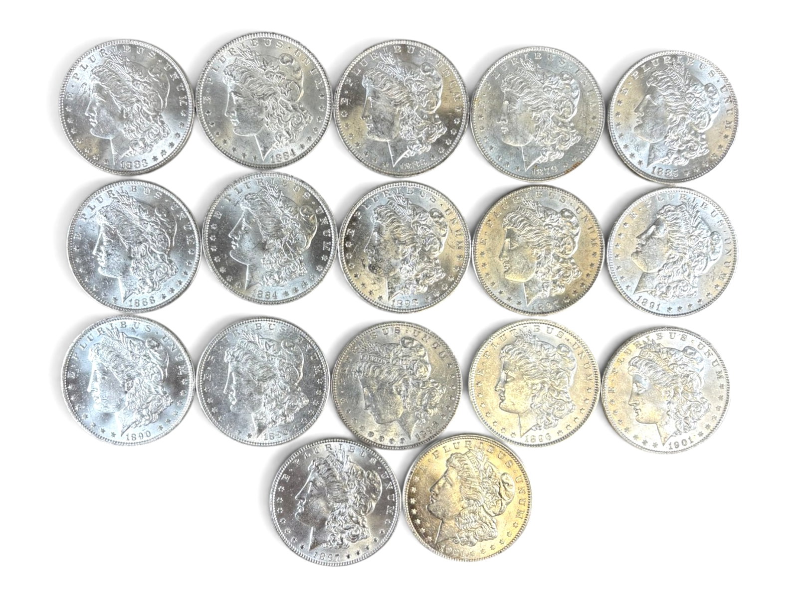 (17) High Grade Morgan Dollars: Group of (17) high grade Morgan dollars. Ungraded. See images for condition. Shipping: Weiss Auctions offers full-service, in-house shipping for nearly all items in this auction. For a shipping quote,