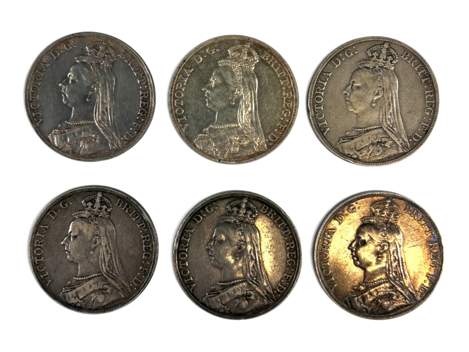 (6) 1888 Great Britain Crowns: Collection of 6 1888 Great Britain crowns. Ungraded. See images for condition. Shipping: Weiss Auctions offers full-service, in-house shipping for nearly all items in this auction. For a shipping