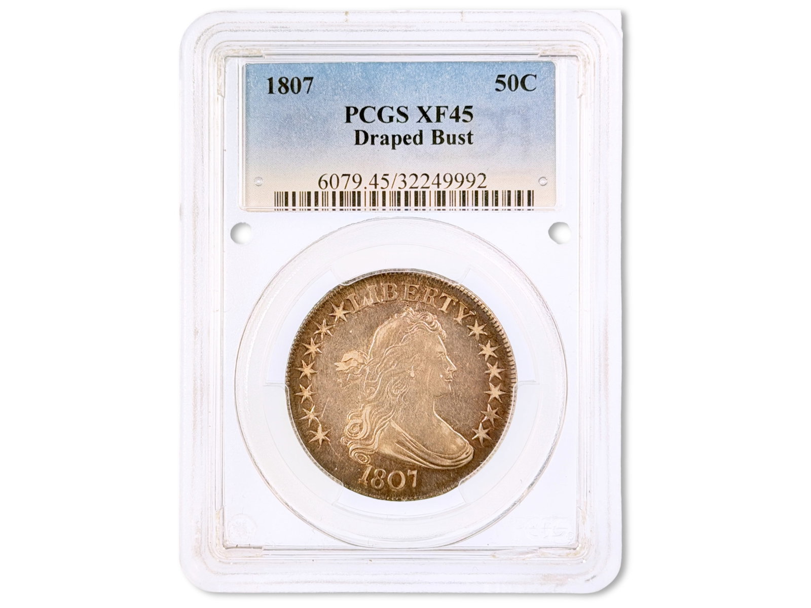 1807 Draped Bust Half Dollar PCGS XF45: 1807 Draped Bust half dollar graded PCGS XF45. PCGS certification #32249992. Shipping: Weiss Auctions offers full-service, in-house shipping for nearly all items in this auction. For a shipping quote,