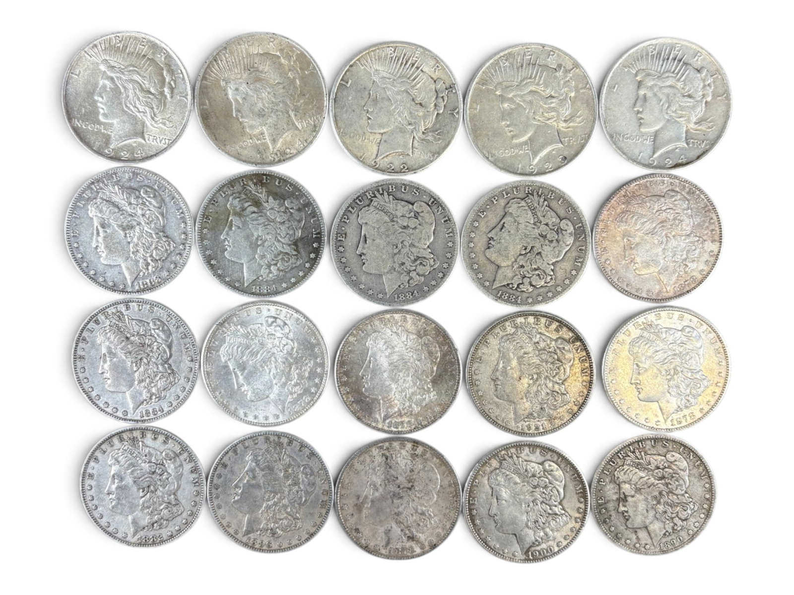 (20) Morgan & Peace Dollars: 20 Morgan Dollar and Peace Dollar coins. Mixed dates and conditions. Shipping: Weiss Auctions offers full-service, in-house shipping for nearly all items in this auction. For a shipping quote, please