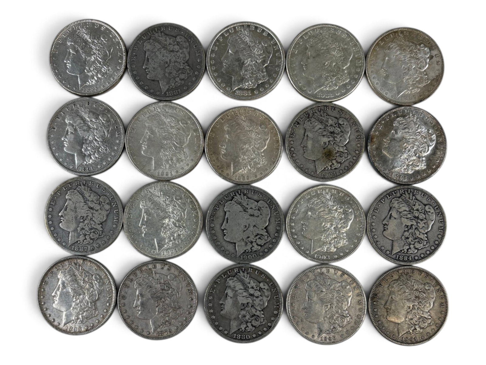 (20) Morgan Dollars: 20 Morgan silver dollars with mixed dates and conditions. Shipping: Weiss Auctions offers full-service, in-house shipping for nearly all items in this auction. For a shipping quote, please contact us