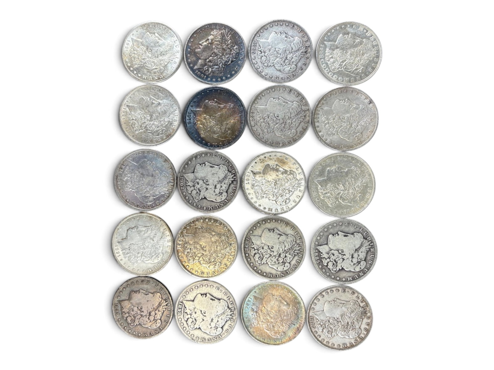(20) Morgan Dollars: 20 Morgan silver dollars with mixed dates and conditions. Shipping: Weiss Auctions offers full-service, in-house shipping for nearly all items in this auction. For a shipping quote, please contact us