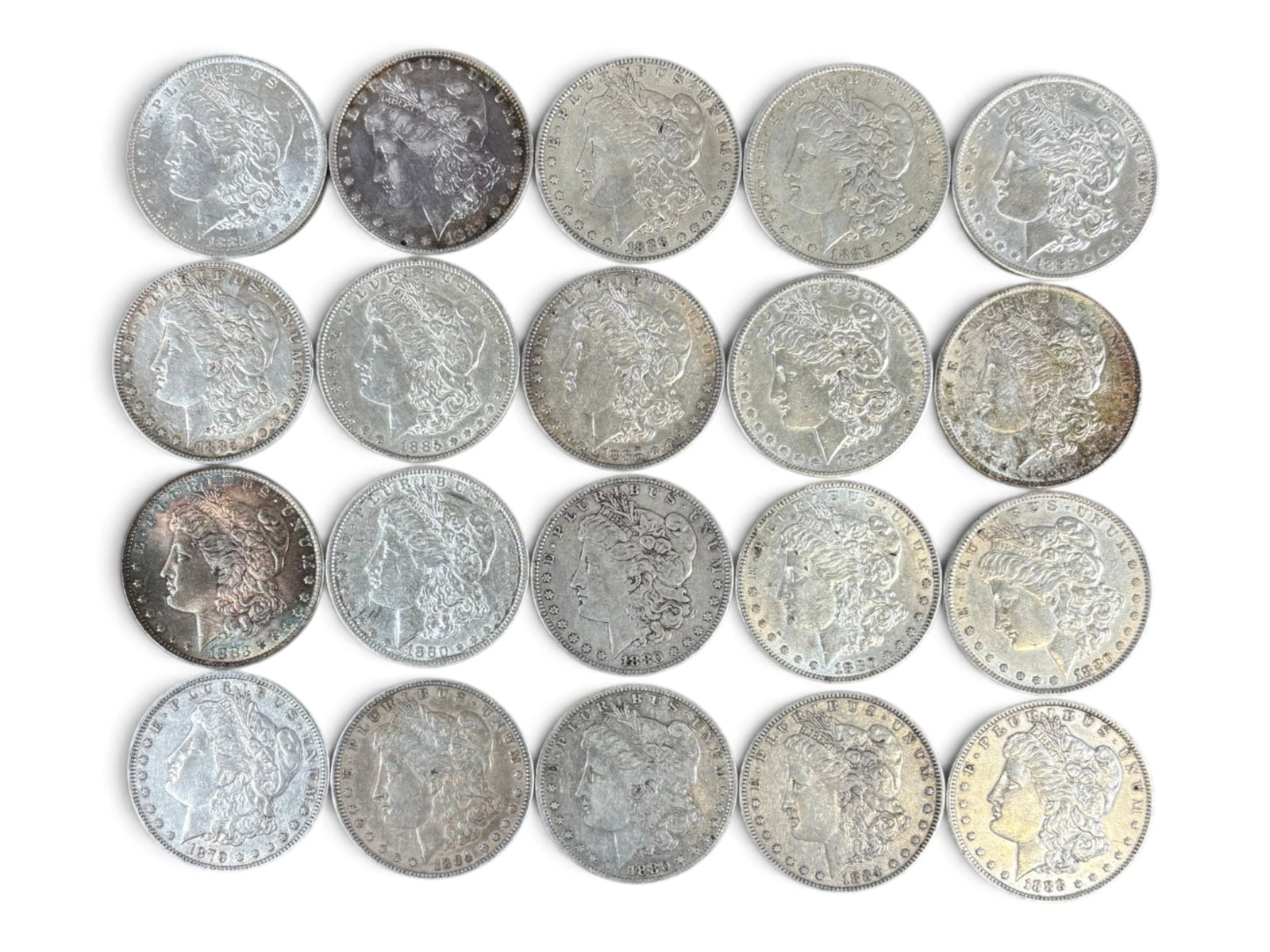 (20) Morgan Dollars: 20 Morgan silver dollars with mixed dates and conditions. Shipping: Weiss Auctions offers full-service, in-house shipping for nearly all items in this auction. For a shipping quote, please contact us
