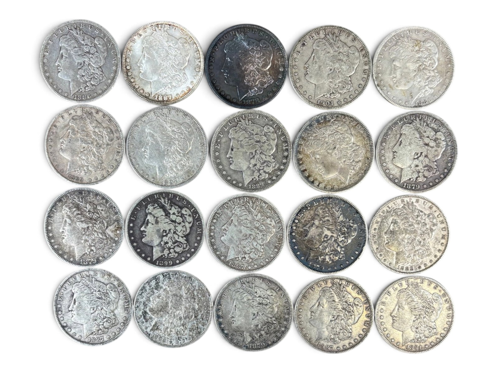 (20) Morgan Dollars: 20 Morgan silver dollars with mixed dates and conditions. Shipping: Weiss Auctions offers full-service, in-house shipping for nearly all items in this auction. For a shipping quote, please contact us